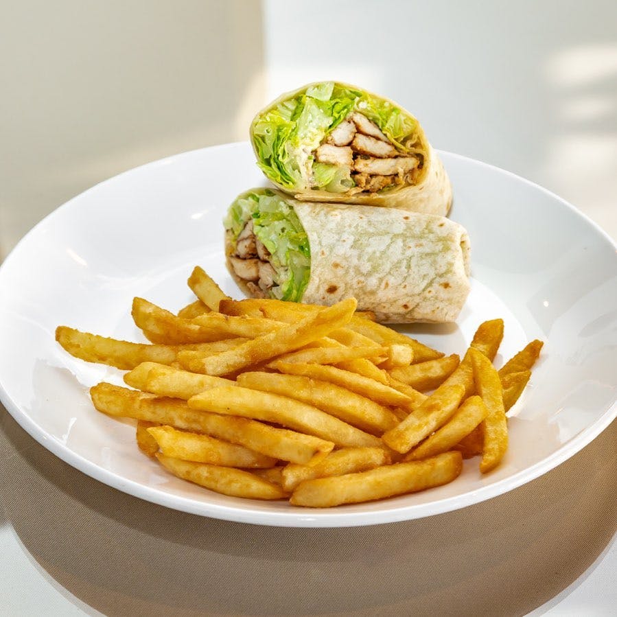 Order Chicken Caesar Wrap - Wrap food online from Dolce Pizzeria & Restaurant store, Fords on bringmethat.com
