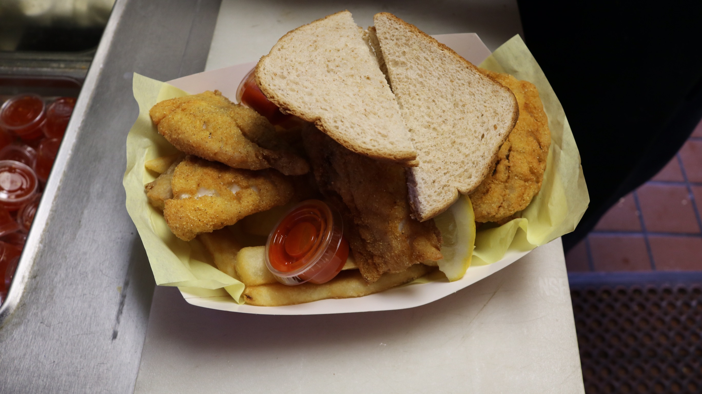 Order Catfish Sandwich food online from The New Snapper's Seafood Restaurant store, Richmond on bringmethat.com