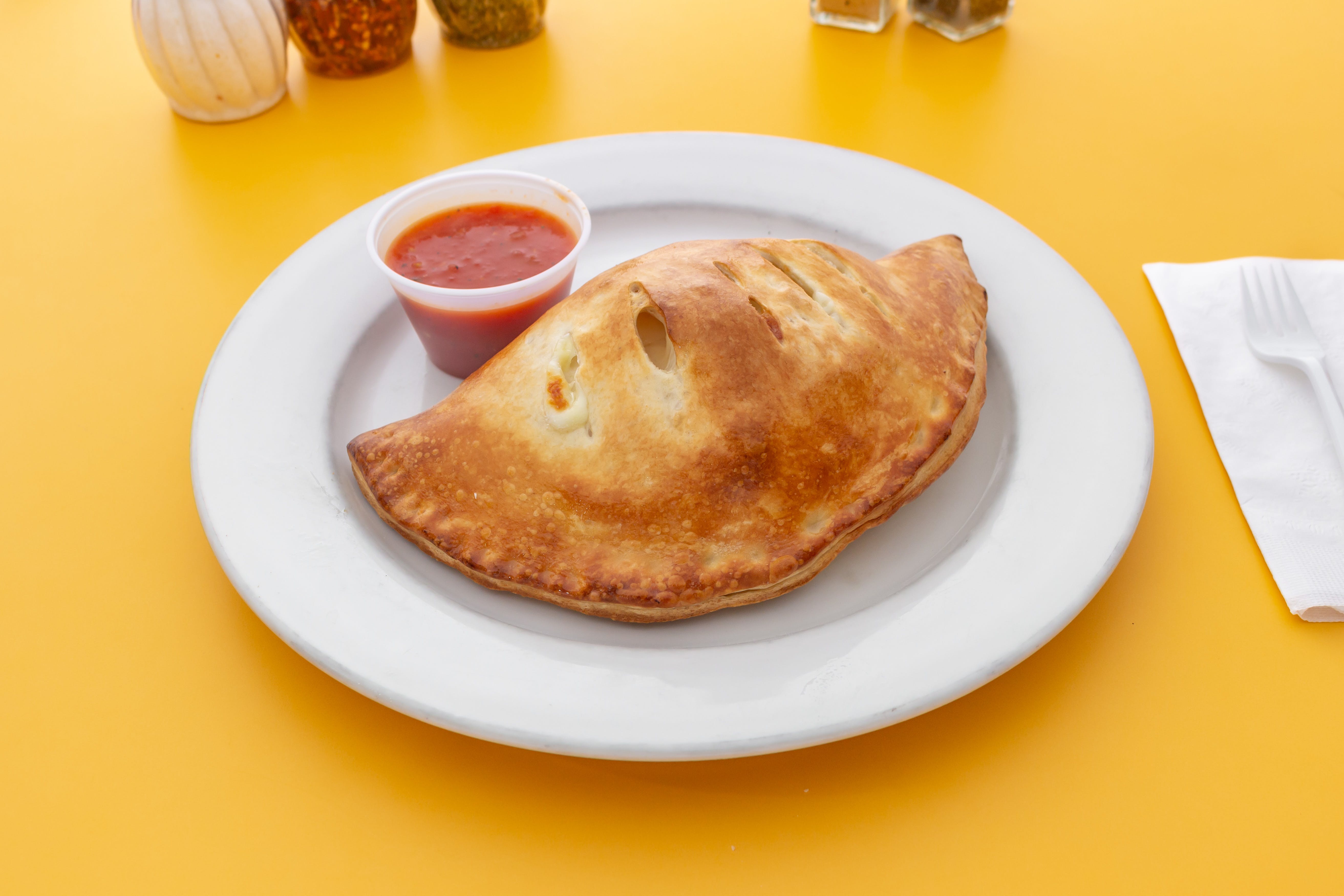 Order Cheese Calzone - Calzone food online from IL Villaggio store, Suffern on bringmethat.com