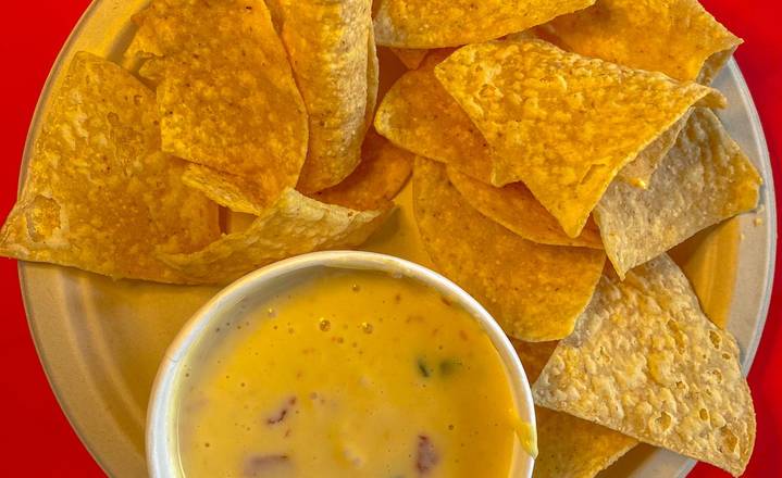 Order Chips And Queso Personal 4 Oz food online from One Taco store, Austin on bringmethat.com