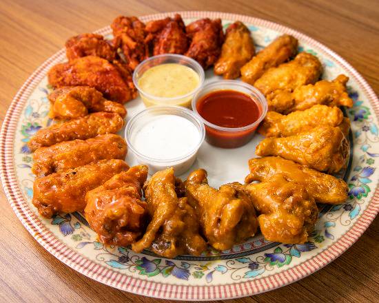 Order 75 Party Wings Only food online from Jr Fish & Chicken store, Memphis on bringmethat.com
