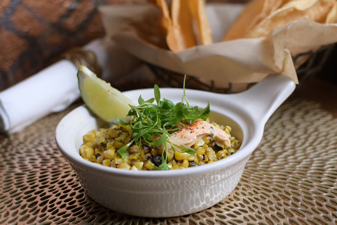 Order Charred Corn Elote with Chips food online from Sausal store, El Segundo on bringmethat.com