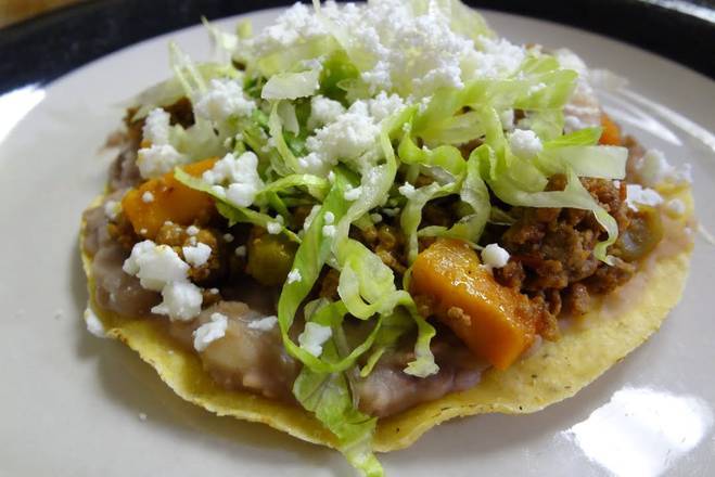 Order Tostada with Choice of Meat food online from Tacos Regio Monterrey store, Lewisville on bringmethat.com