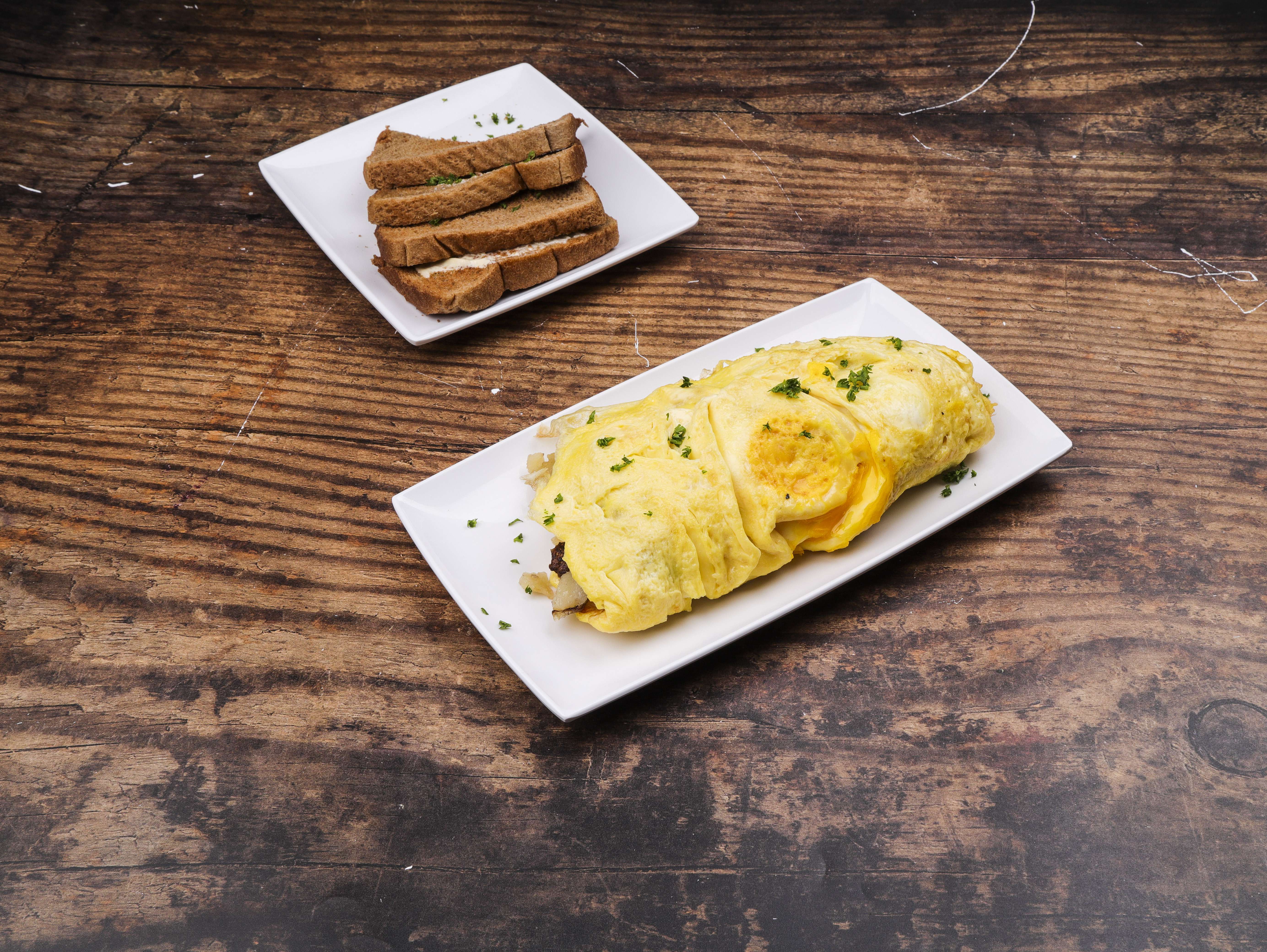 Order Country Breakfast Omelette food online from Sam's Diner store, Maumee on bringmethat.com