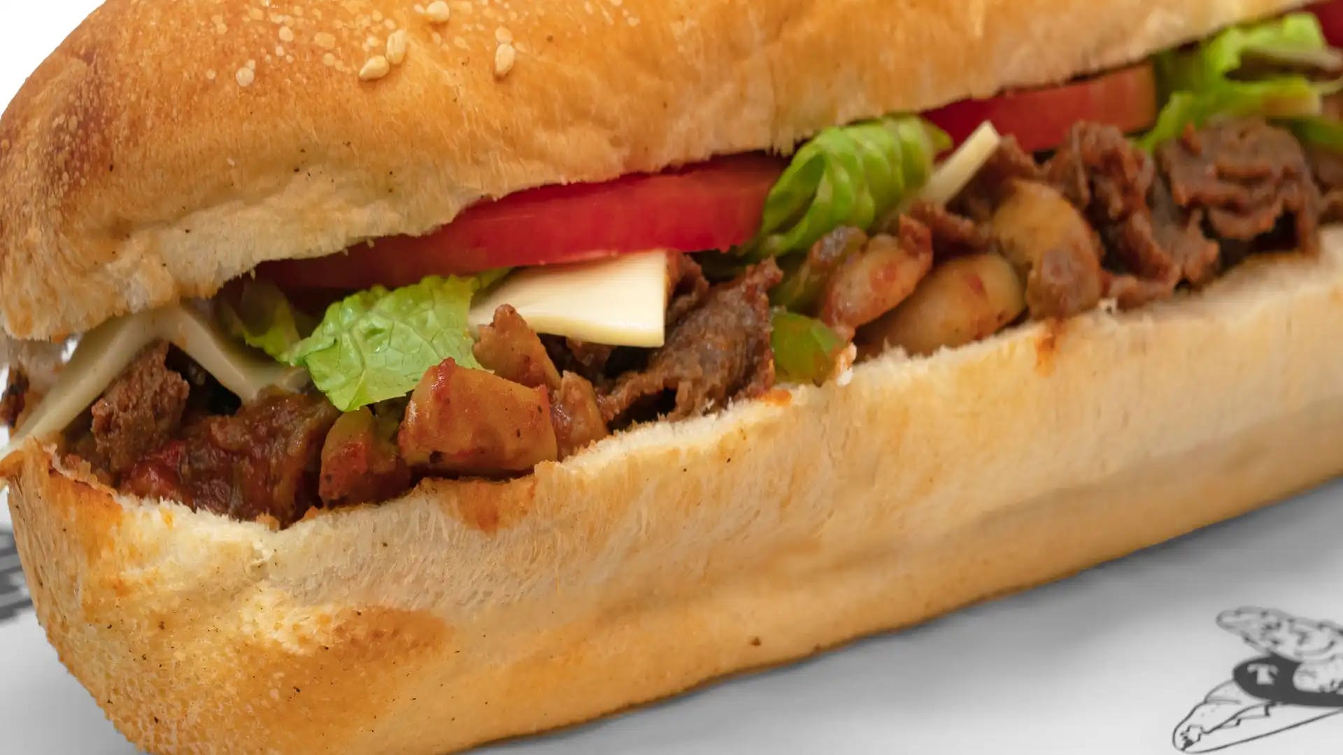 Order Loaded Steak Sub - Small food online from Tubby's Grilled Submarines store, Westland on bringmethat.com