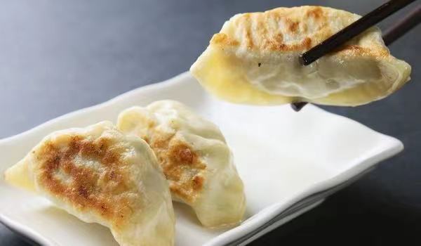 Order  Pan Fried Potstickers 香煎鍋貼 food online from Dim Sum Club store, San Francisco on bringmethat.com