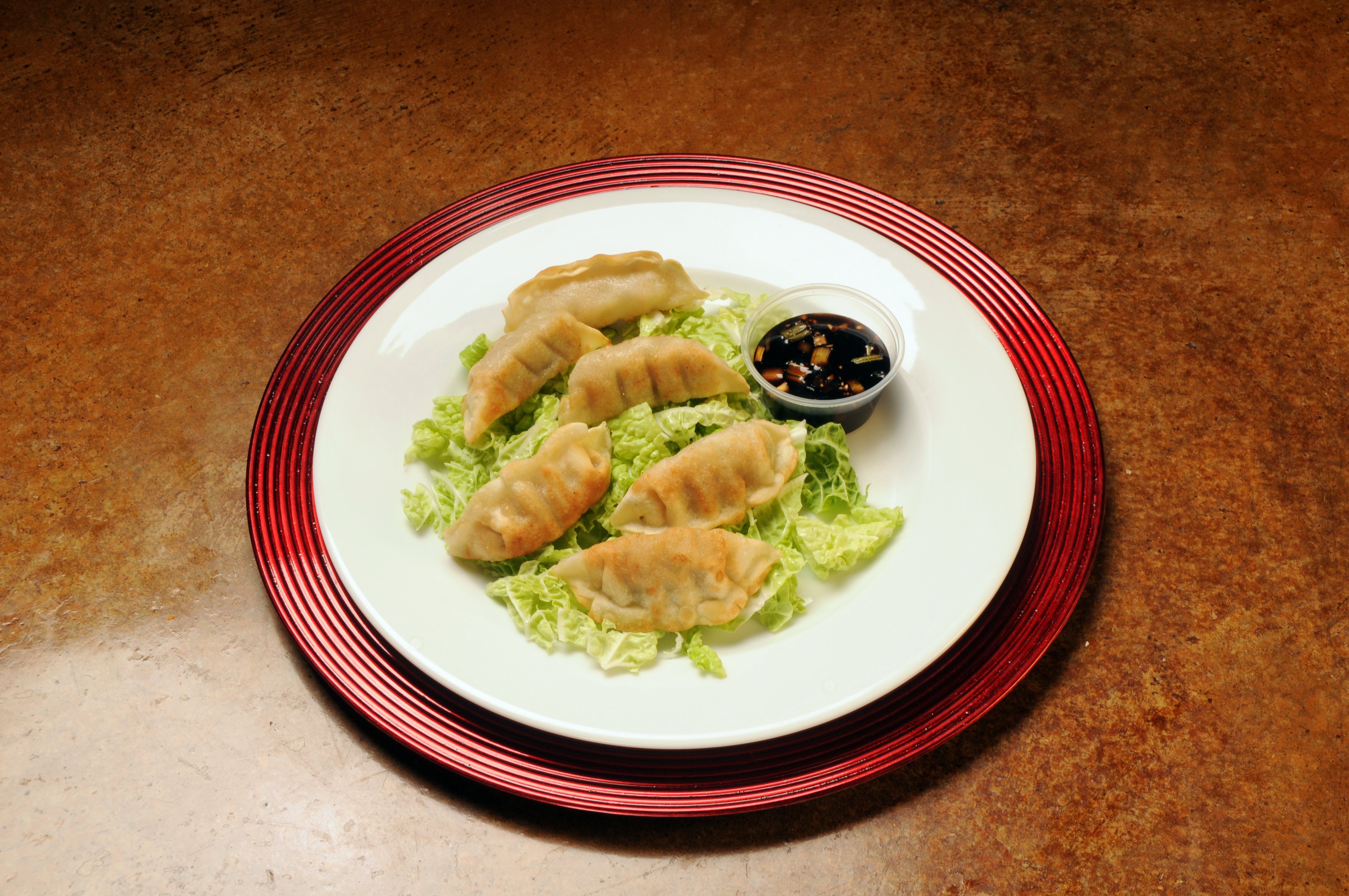 Order A3. Fried Dumplings food online from Wok On Wheels store, San Antonio on bringmethat.com