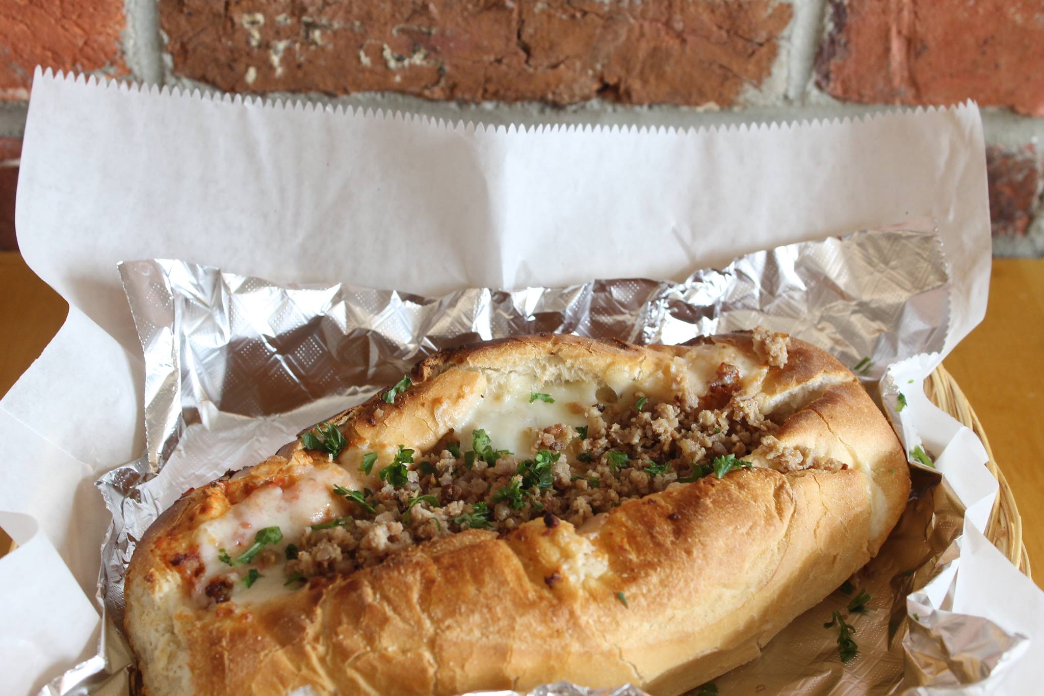 Order Italian Sausage Parmesan Sub food online from Emilio Brick Oven Pizza store, Sterling on bringmethat.com