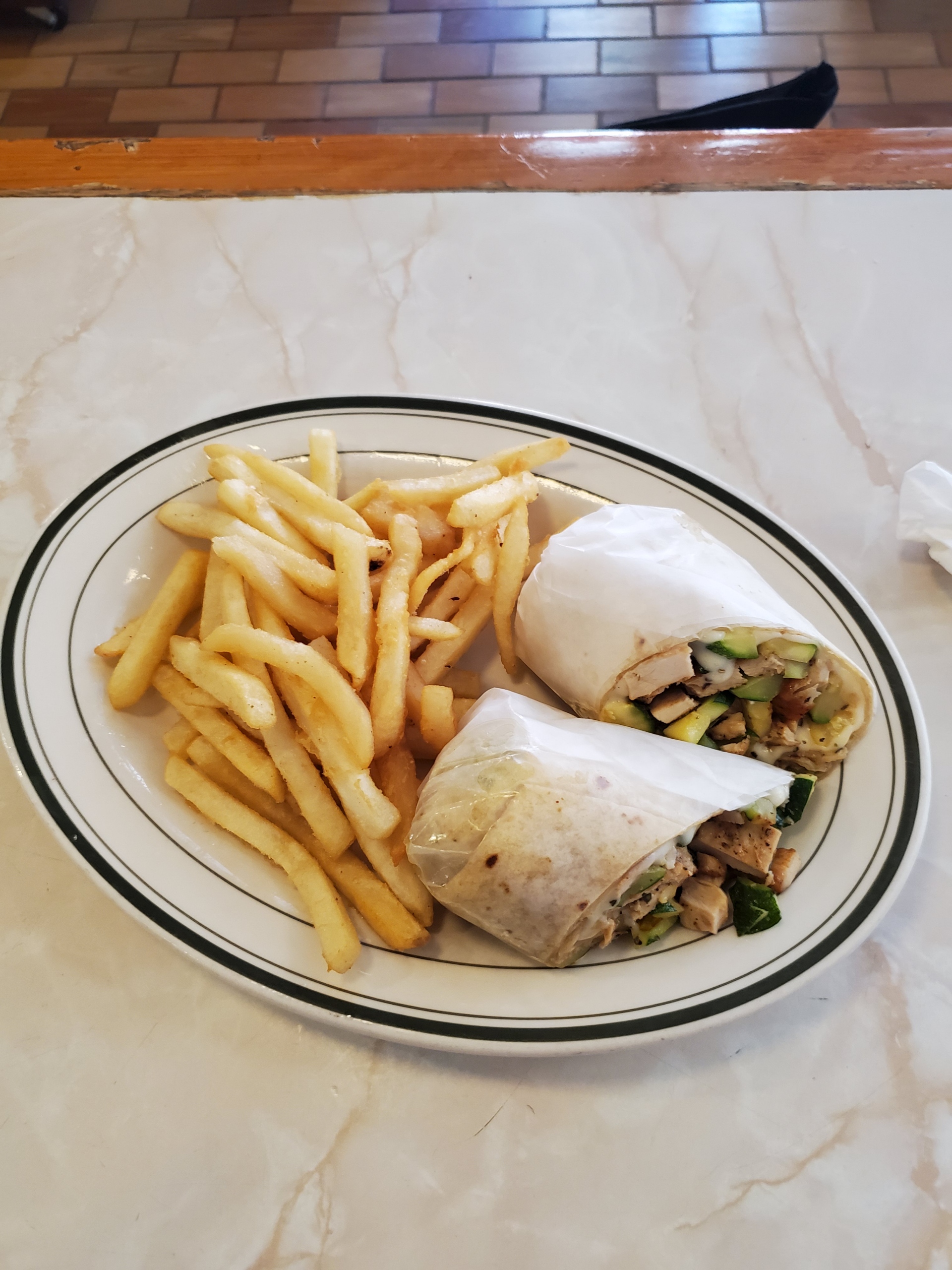 Order Greek Salad Chicken Wrap food online from Ritz Diner store, New York on bringmethat.com