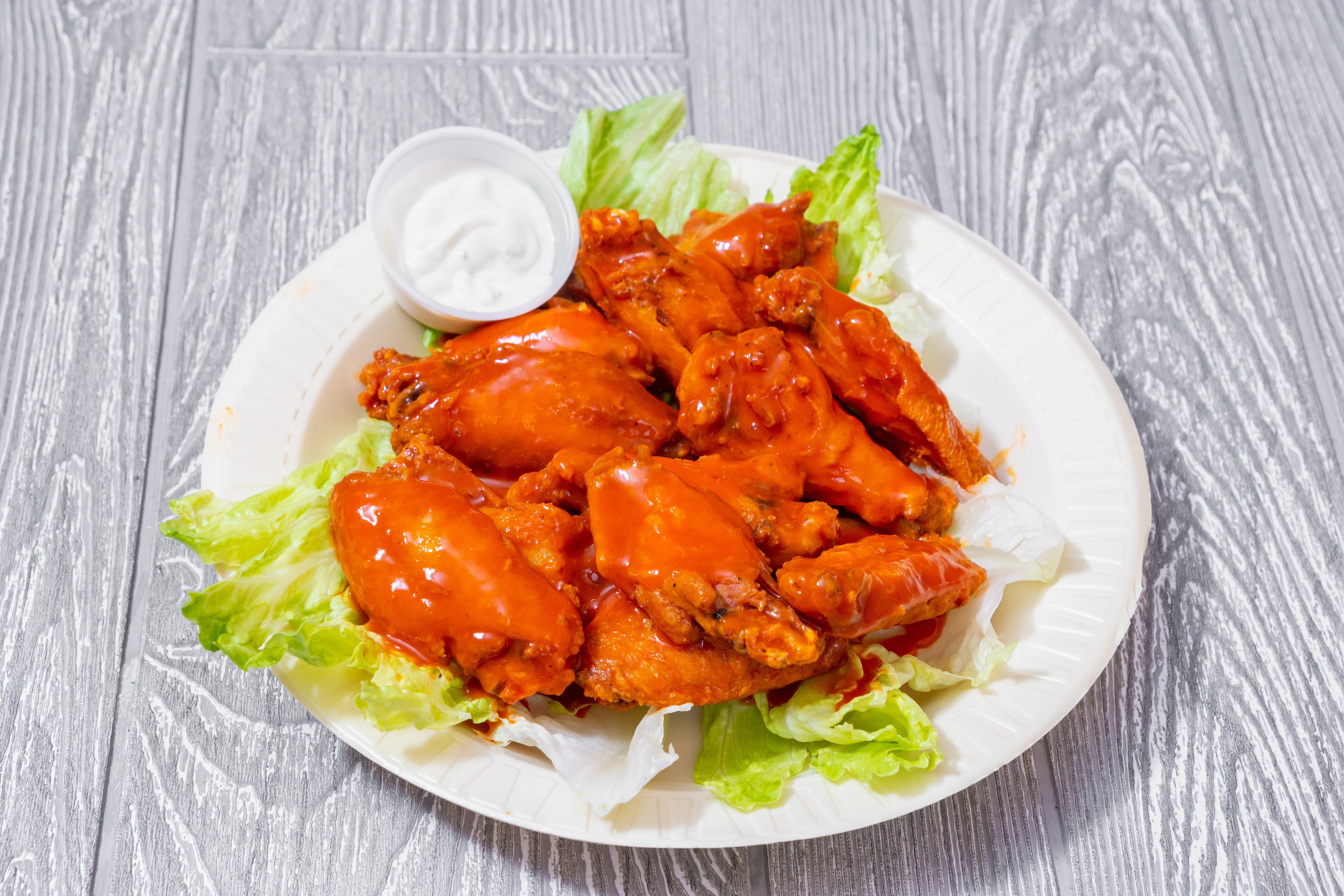 Order Buffalo Wings - 10 Pieces food online from Bravo Pizza store, Avondale on bringmethat.com