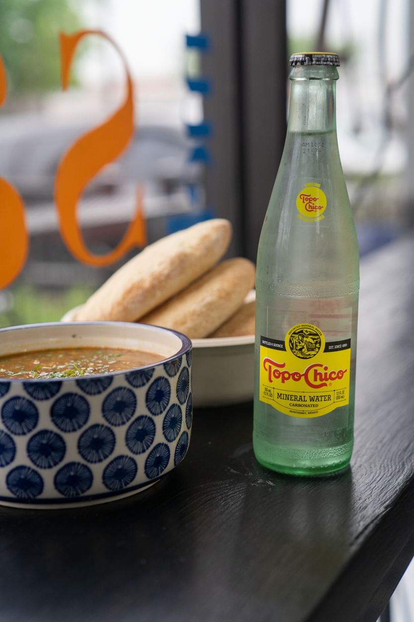 Order Topo Chico food online from Zoa Moroccan Kitchen store, Houston on bringmethat.com
