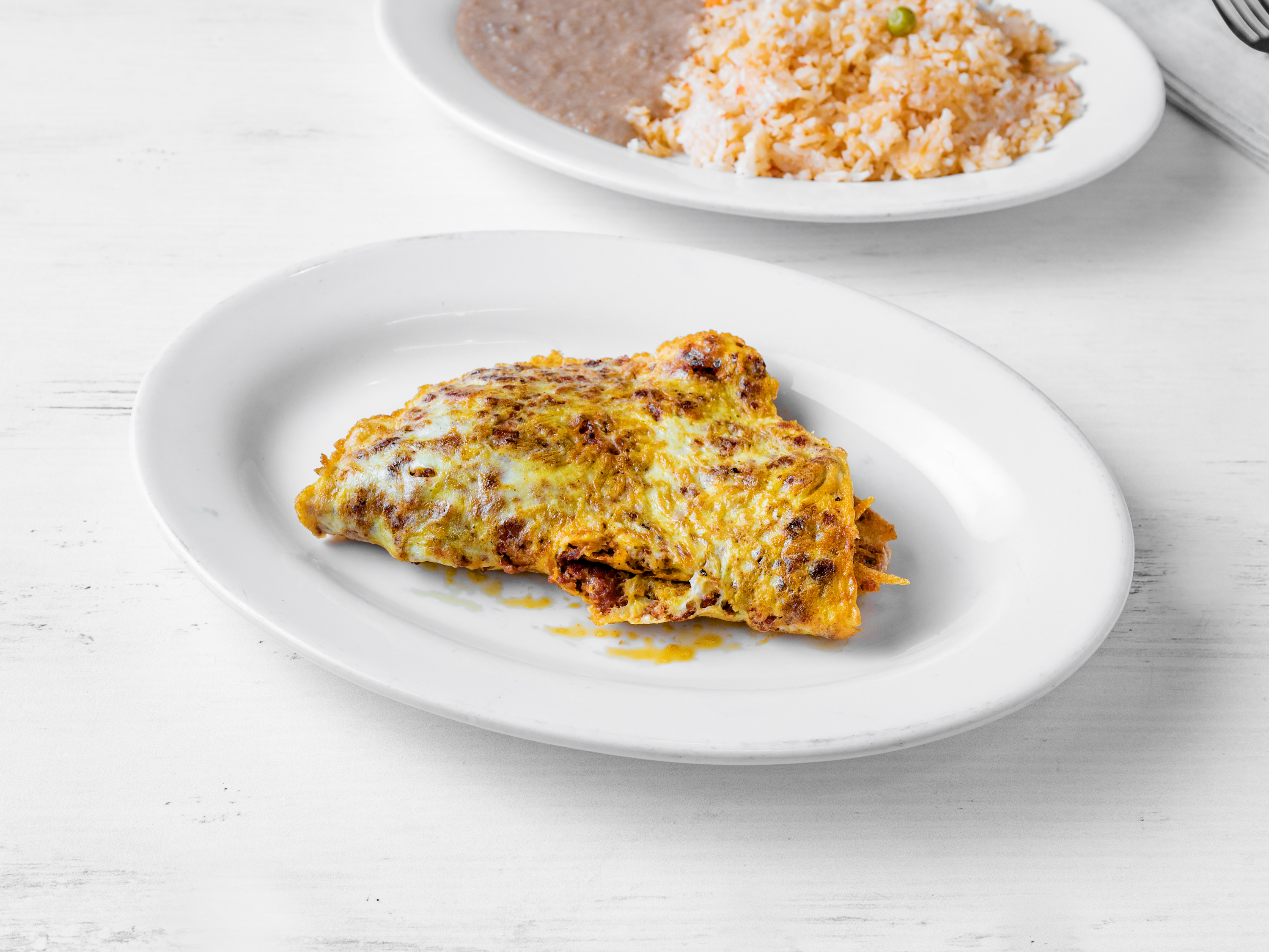 Order Huevos con Chorizo  food online from Josefina's Mexican Restaurant store, Elmhurst on bringmethat.com