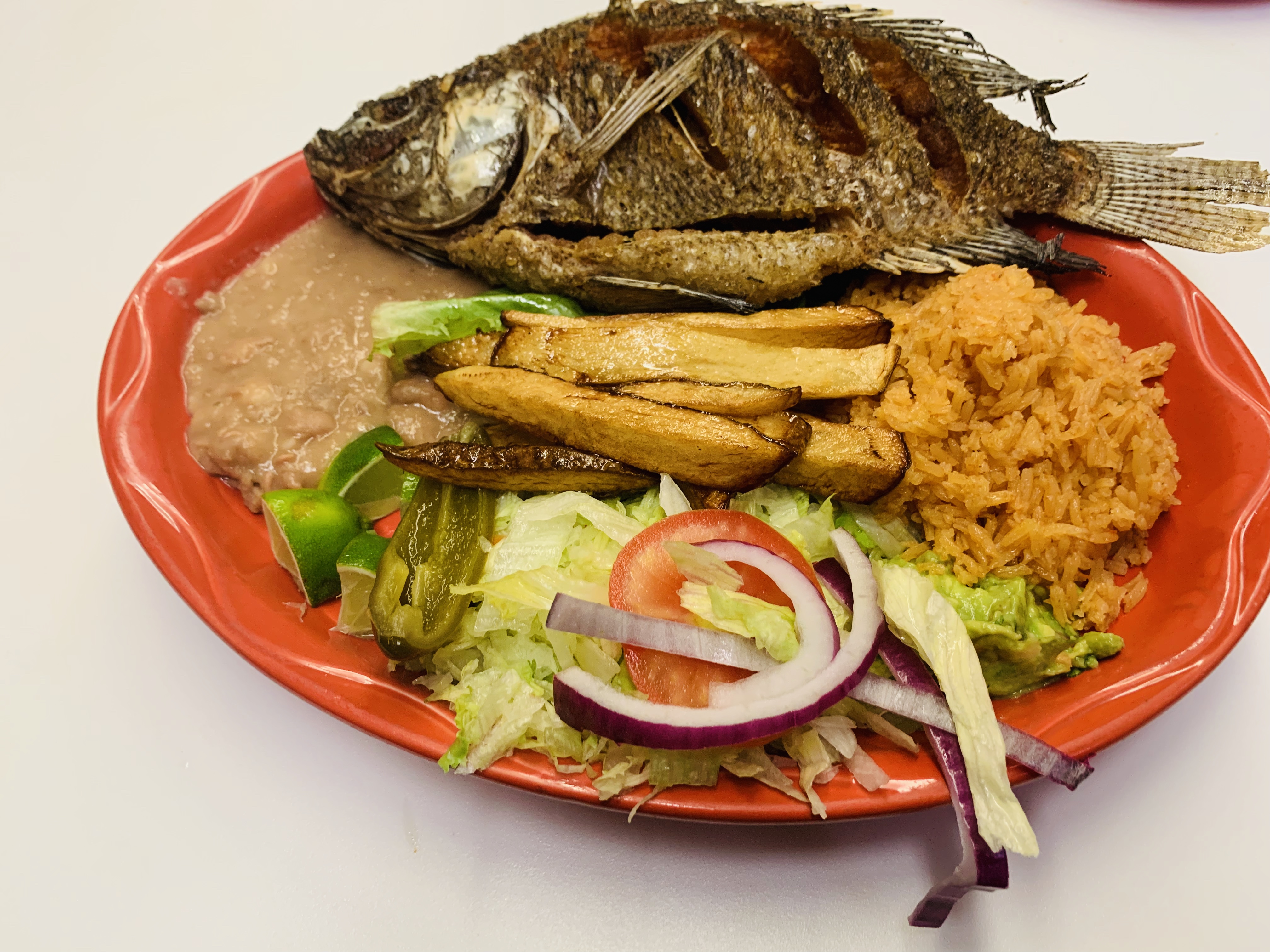 Order Mojarra Frito Plate food online from El Michoacano store, Gilroy on bringmethat.com