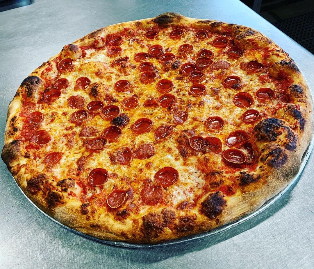Order Round Classic Pepperoni Pie - 18" (8 Slices) food online from Slicebox Pizza store, Seattle on bringmethat.com