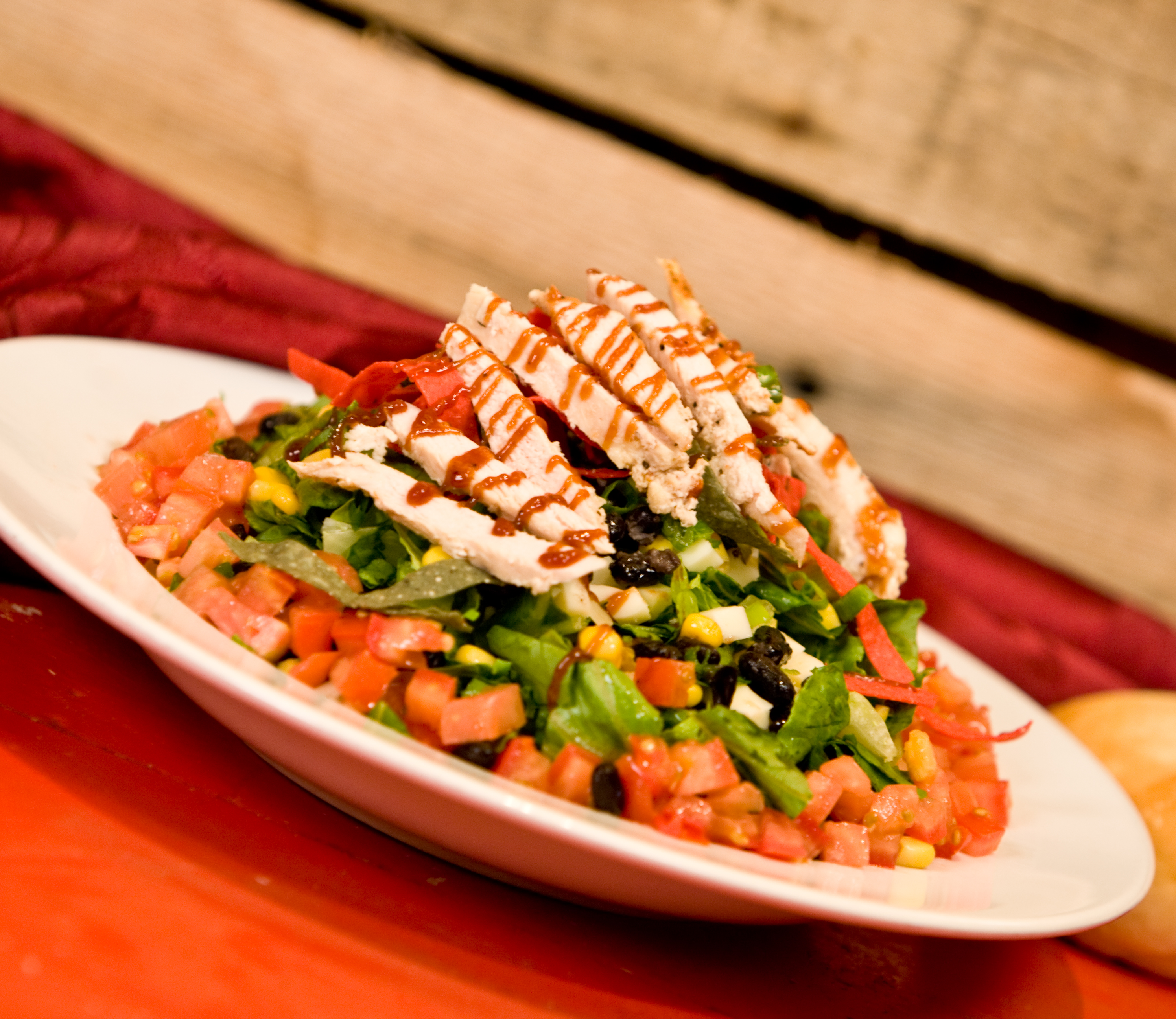 Order Buck's BBQ Chicken Chopped Salad food online from Selma Chicago Pizzeria store, Ladera Ranch on bringmethat.com