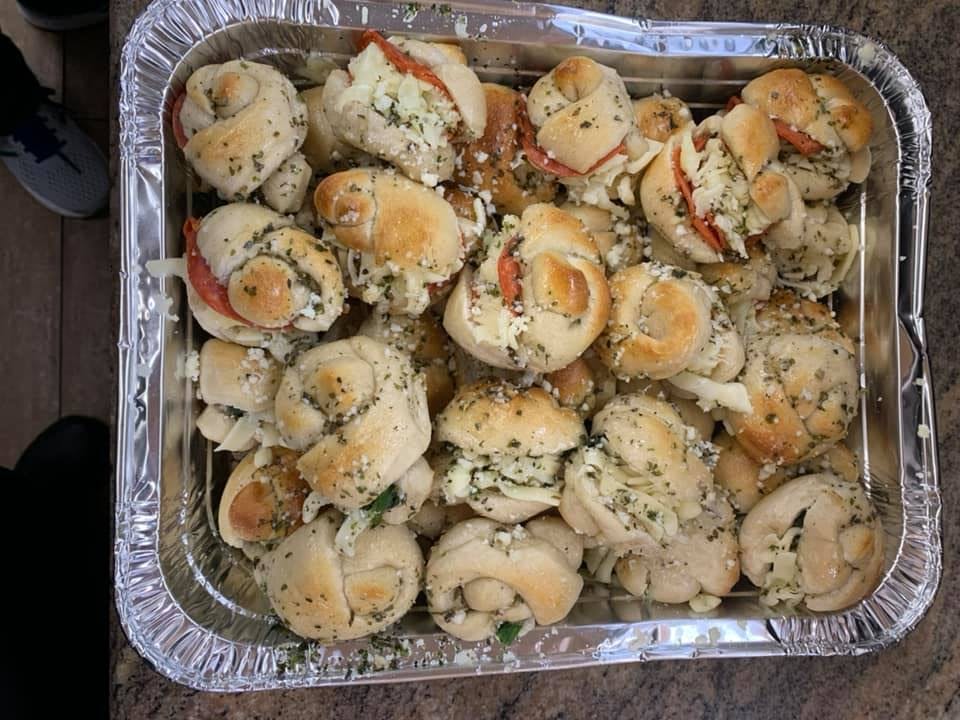 Order Garlic Knots - 6 Pieces food online from Bonbino's Pizza store, Oceanside on bringmethat.com