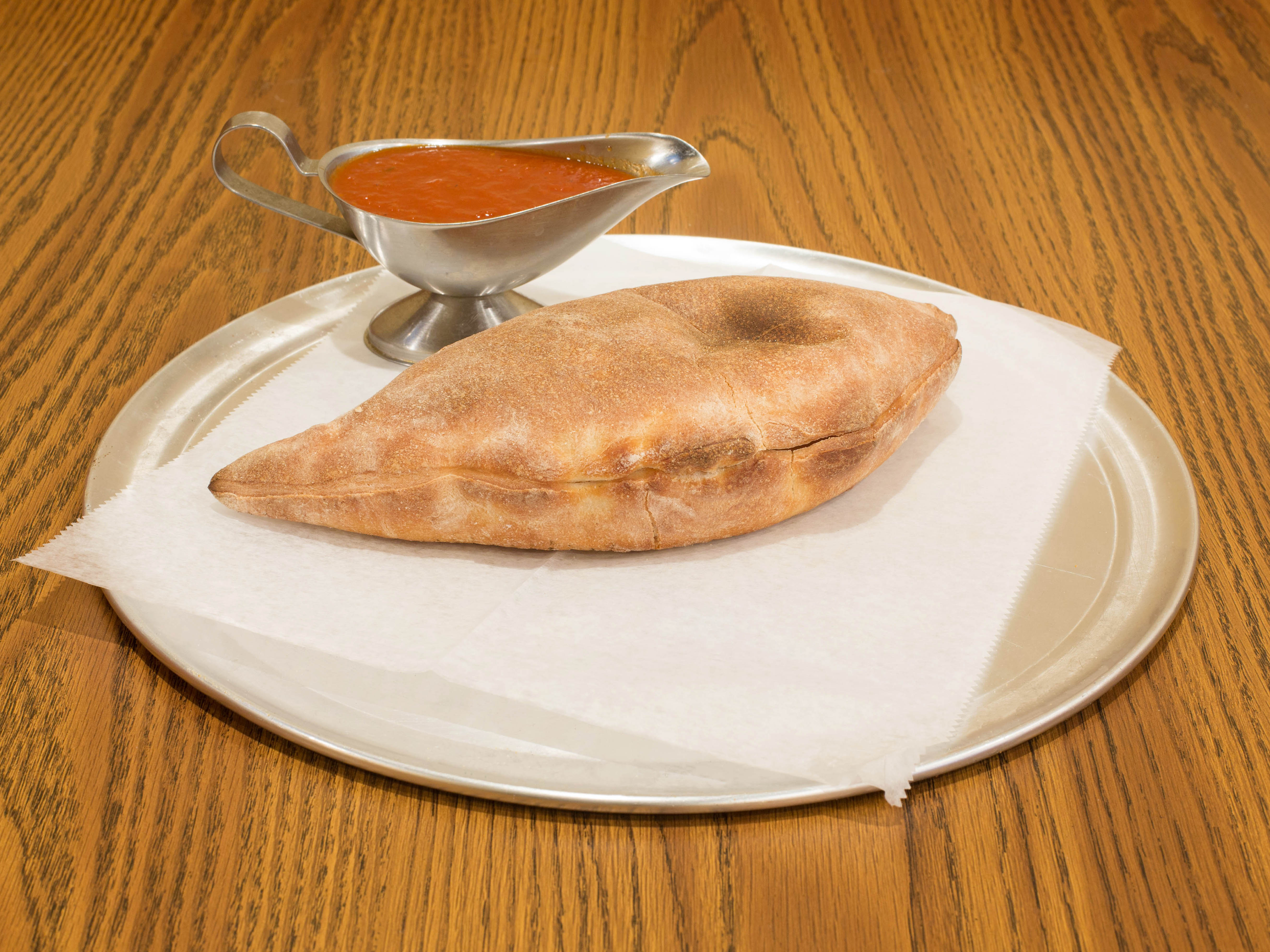 Order Ricotta and Mozzarella Cheese Calzone food online from Puzo Family Restaurant store, North Haledon on bringmethat.com