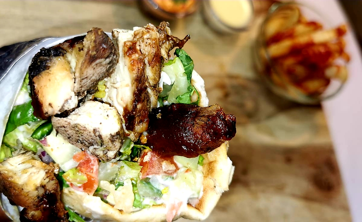 Order Jerk Chicken Gyro Combo food online from Gyro Eats store, New York on bringmethat.com