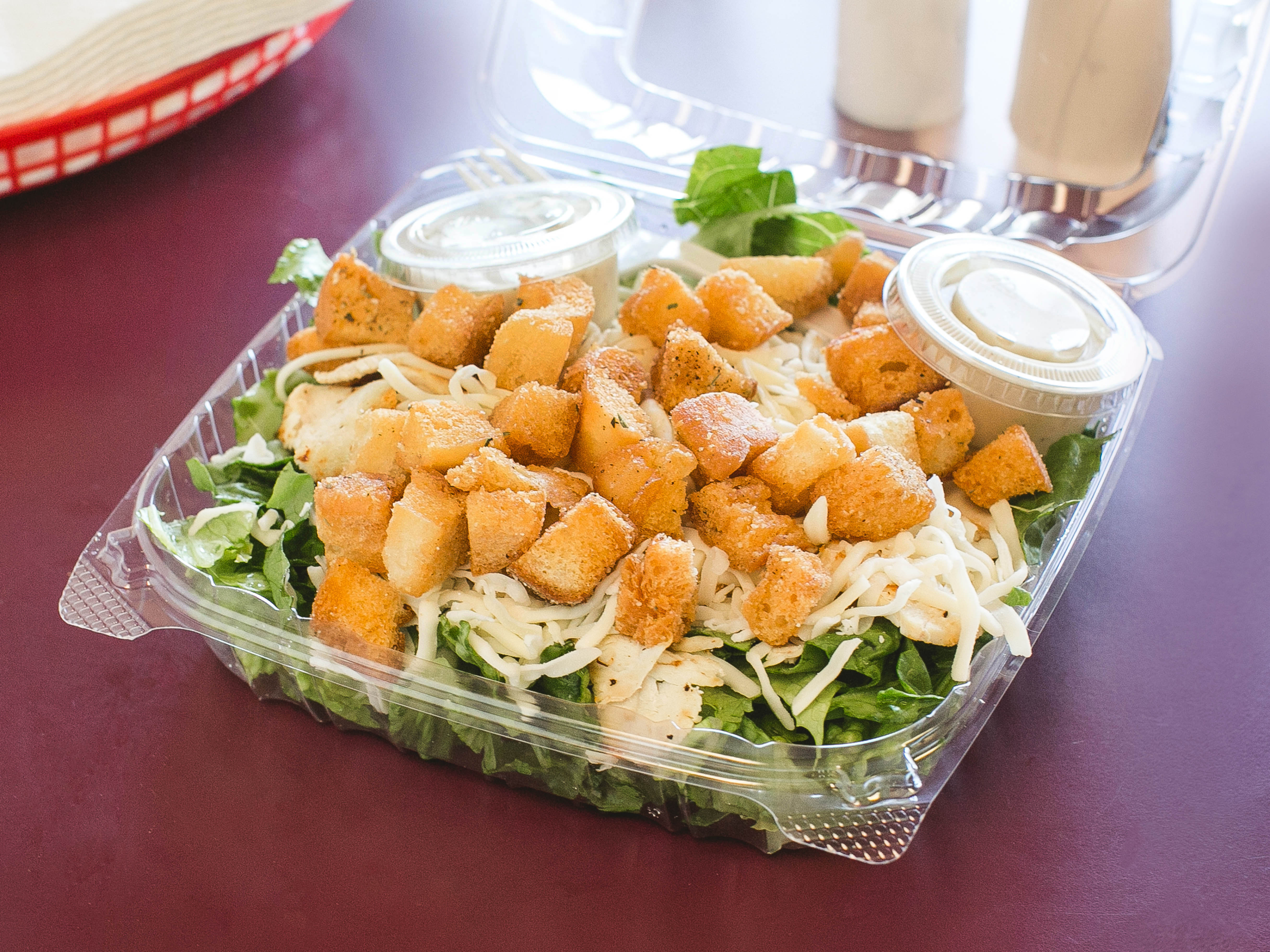 Order Grilled Chicken Caesar Salad food online from Dynamite Subs store, Reading on bringmethat.com