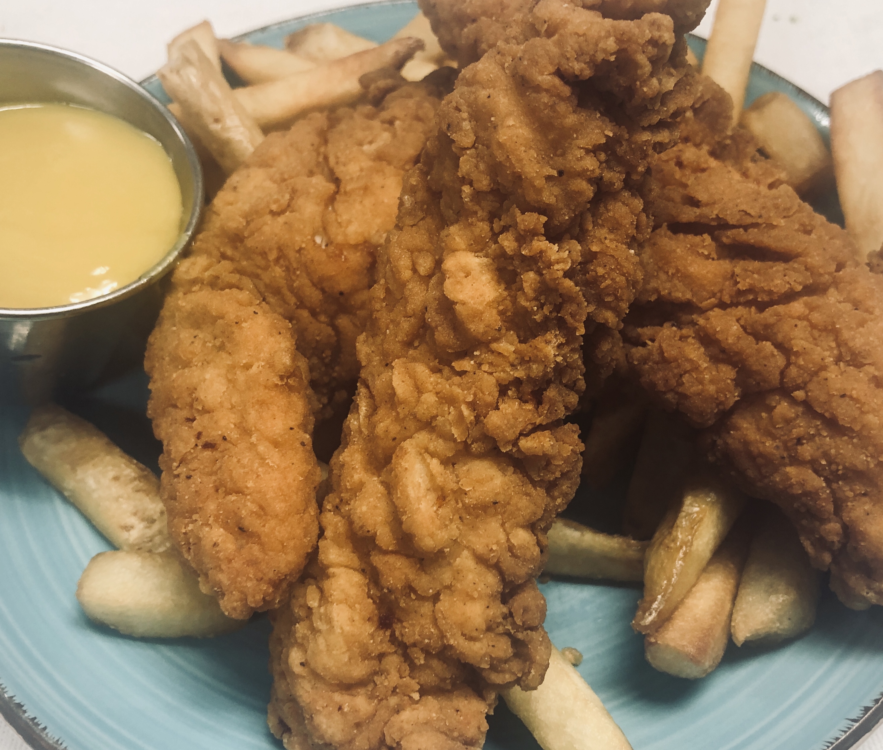 Order Chicken Tenders with French Fries food online from Siena Cafe store, New York on bringmethat.com