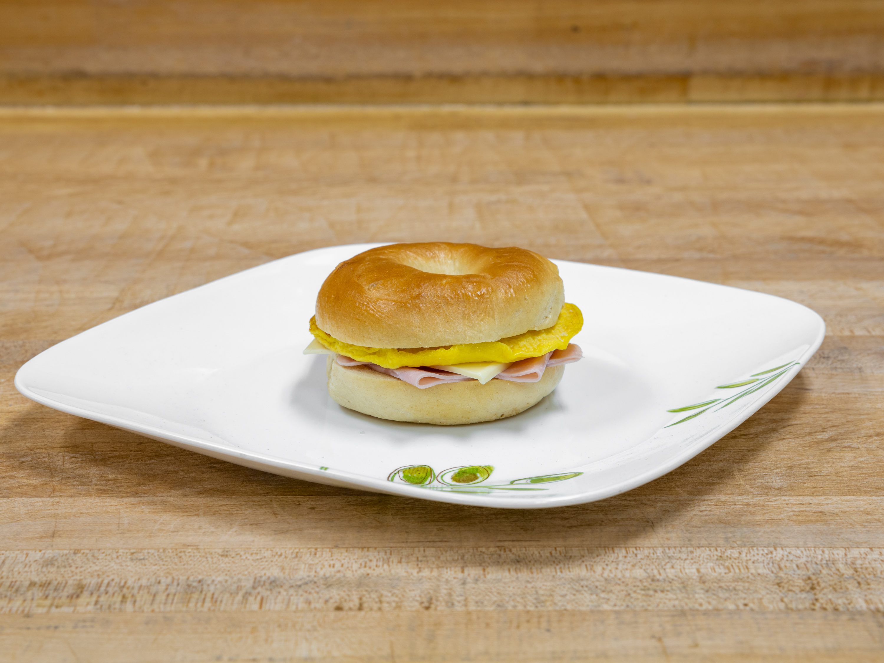 Order B-5 Ham & Egg & Cheese Bagel food online from K-Inn Donuts store, Paramount on bringmethat.com