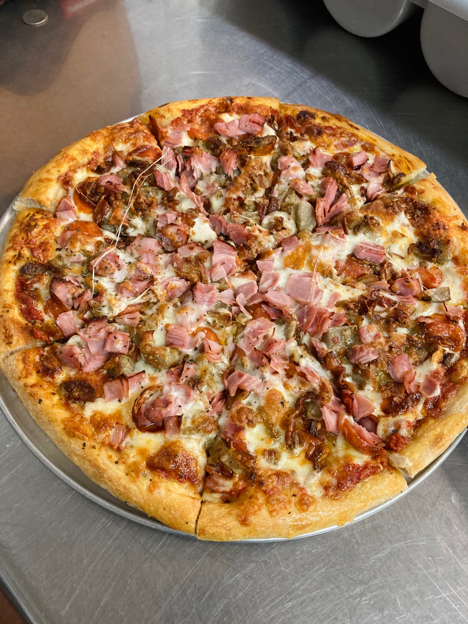 Order 10" or 14" Meatlovers Pizza food online from Saints Pub + Patio store, Independence on bringmethat.com