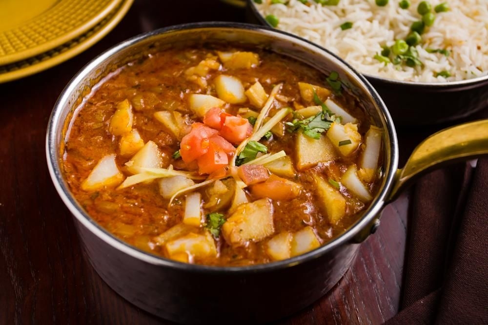 Order Aloo Wadi food online from Dhaba indian cuisine store, New York on bringmethat.com