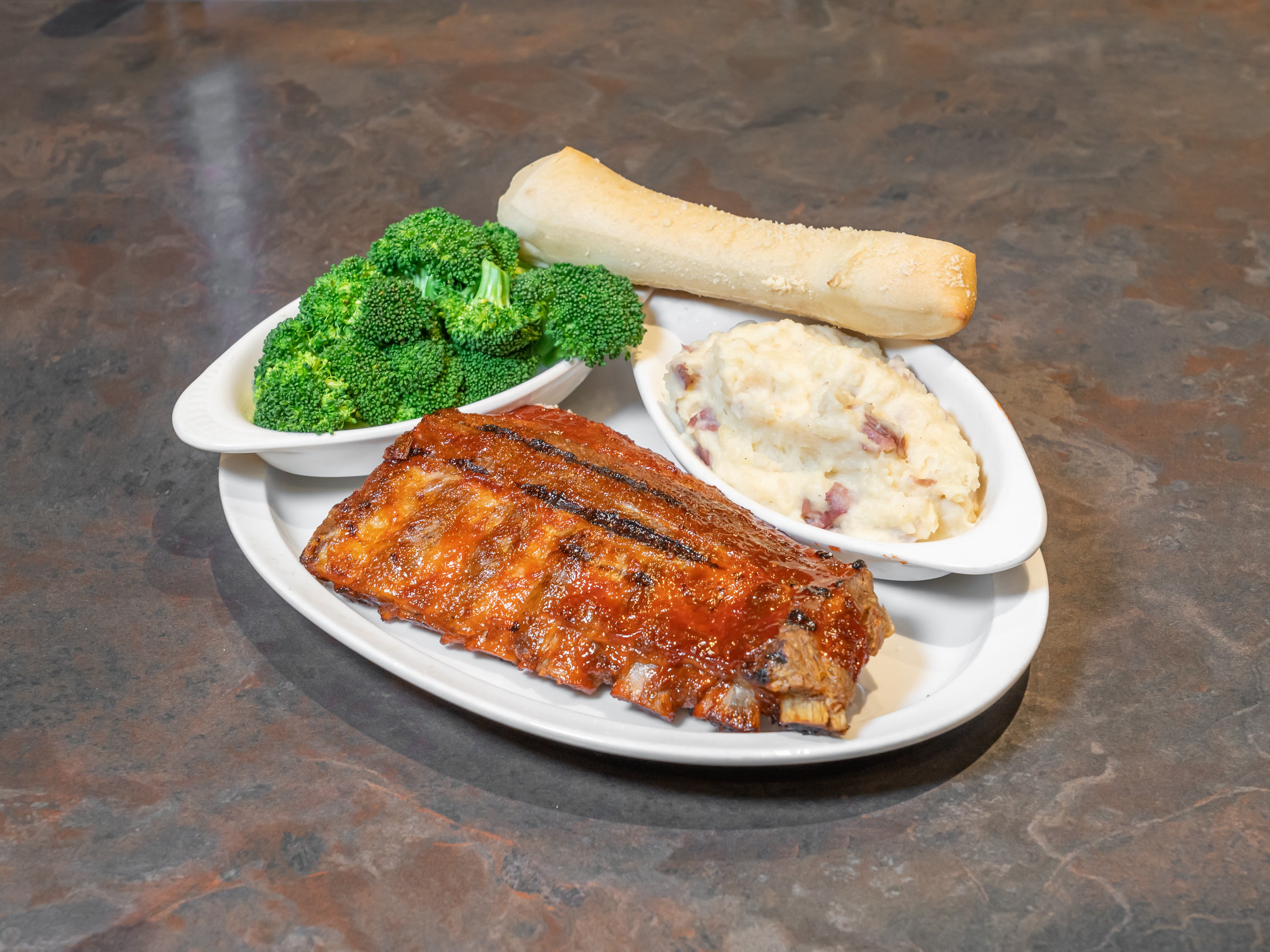 Order Half Slab of Firehouse BBQ Baby Back Ribs food online from Shelby Firehouse Tavern store, Shelby Charter Township on bringmethat.com