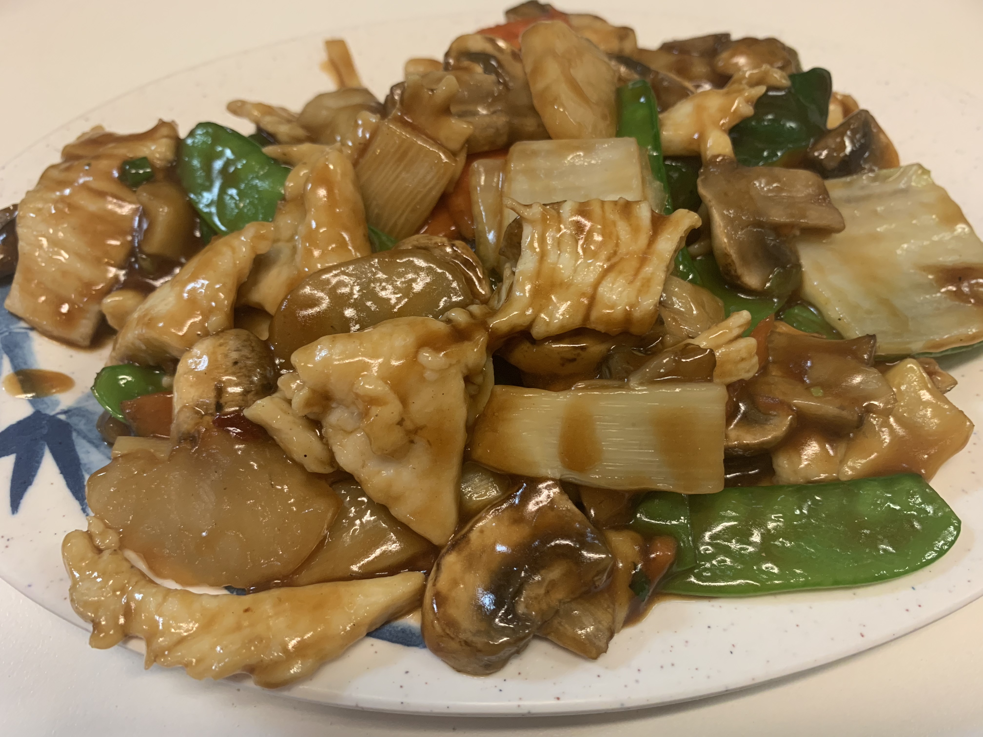 Order 36. Chicken with Fresh Mushroom and Snow Peas food online from Tsing Tao Chinese Cuisine store, Mesa on bringmethat.com