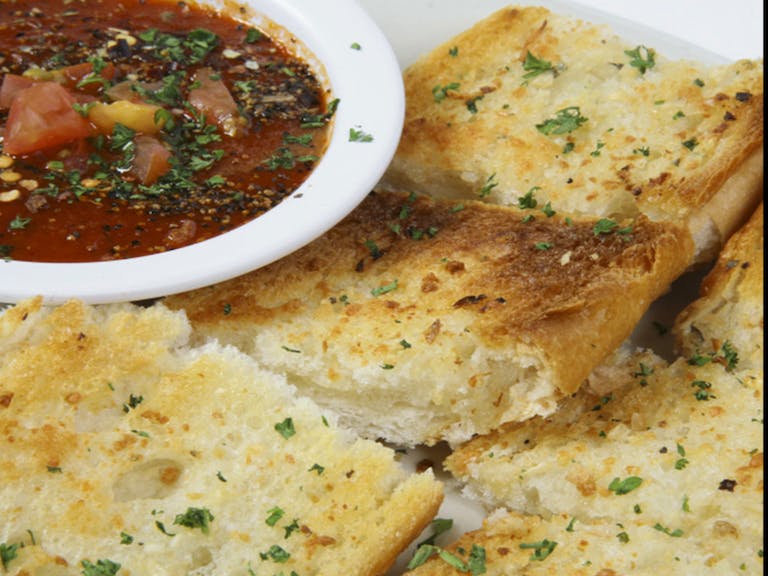 Order Basket of Garlic French Bread - Appetizer food online from Napoli Pizza & Pasta store, Houston on bringmethat.com