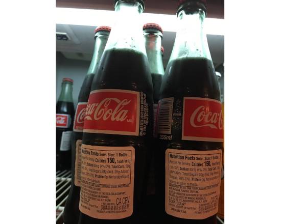 Order Coca Cola Bottle food online from Taqueria El Dorado store, Chicago on bringmethat.com