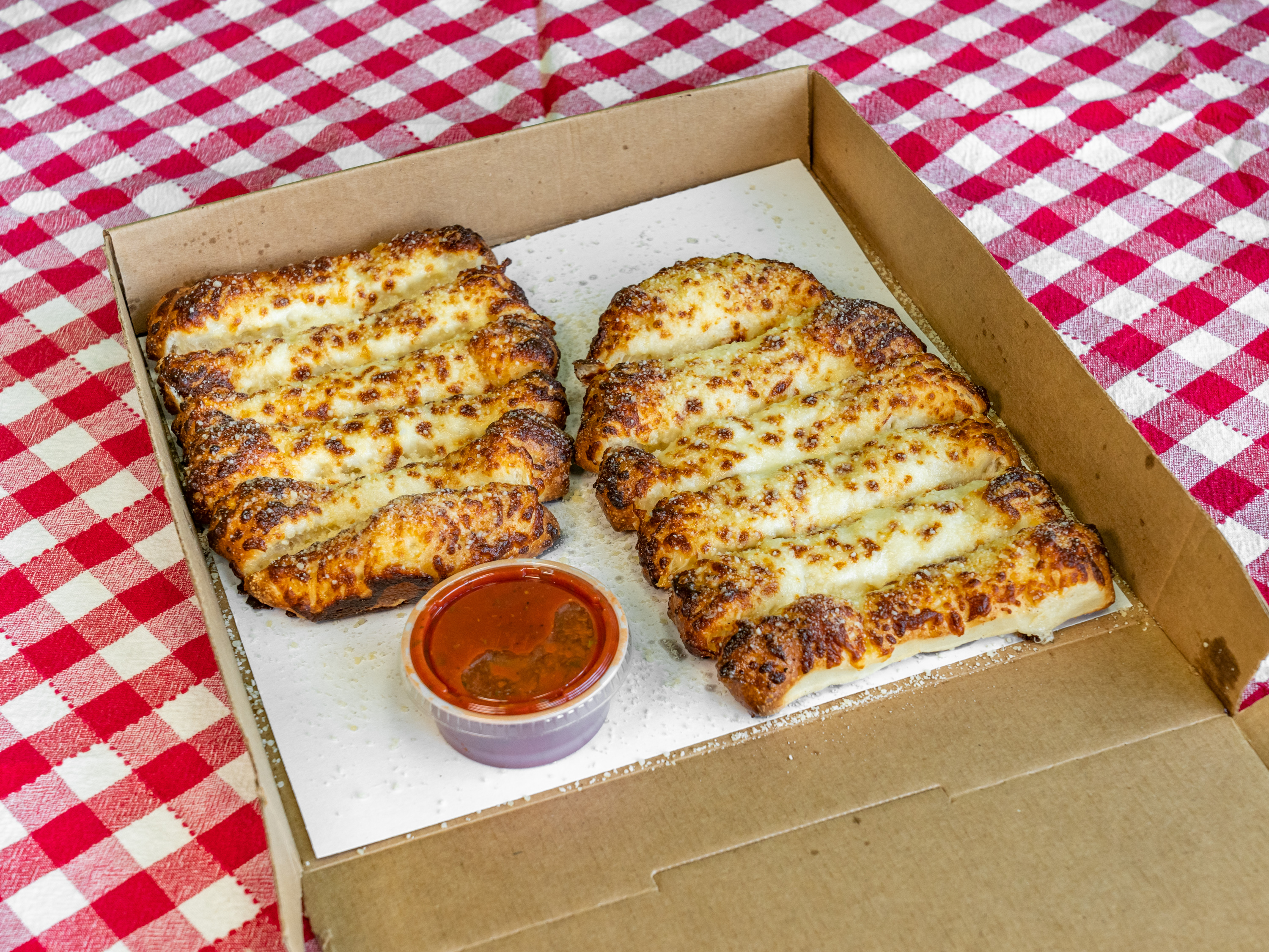Order Cheese Dough Stix (12pc) food online from What Up Dough Pizzeria store, Utica on bringmethat.com