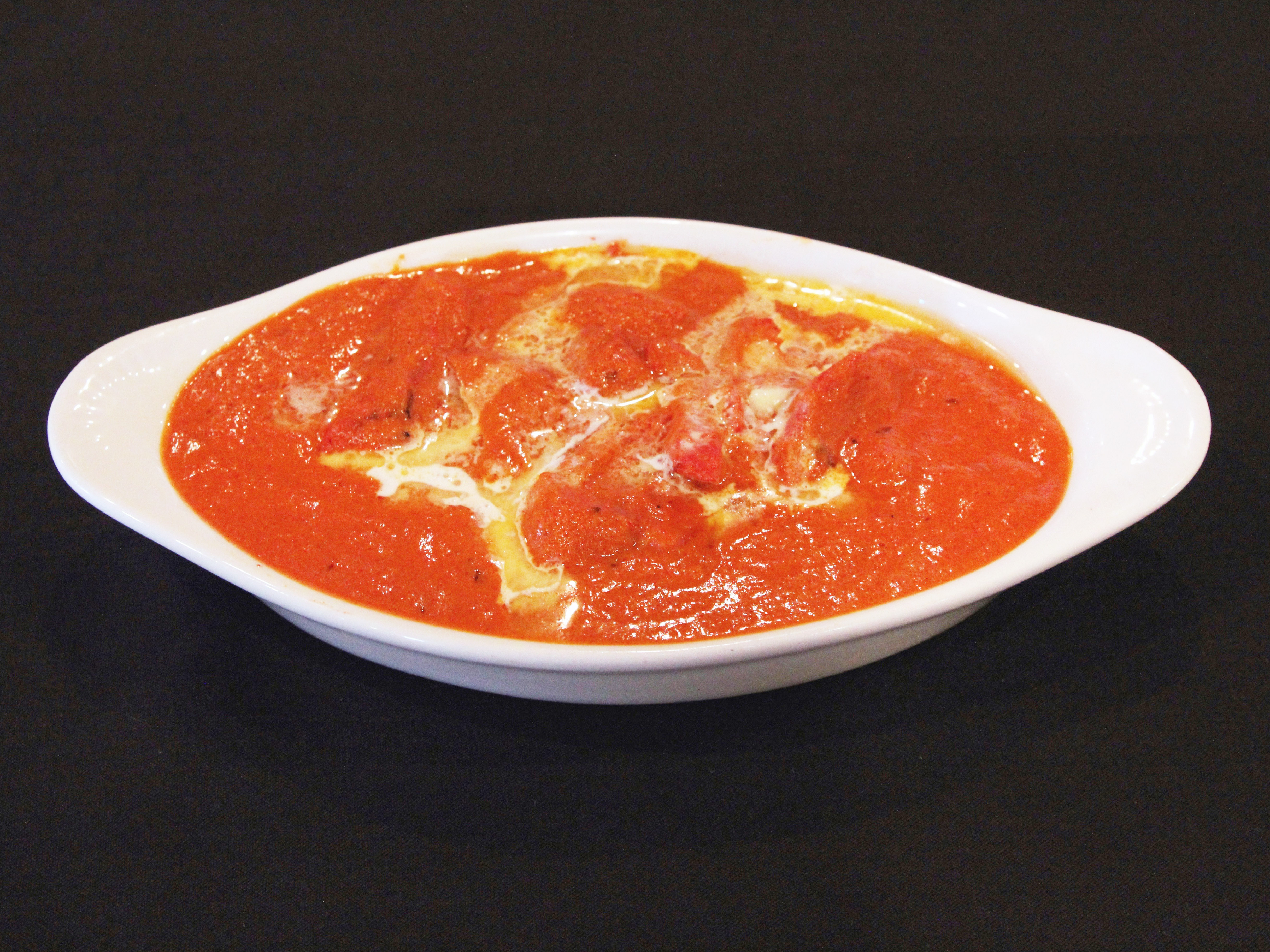 Order Butter Chicken food online from Paradise Biryani Pointe store, Parma on bringmethat.com
