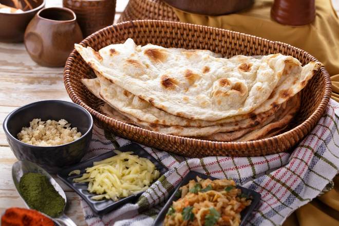 Order Plain Naan food online from Haldi Indian Cuisine store, Glendale on bringmethat.com