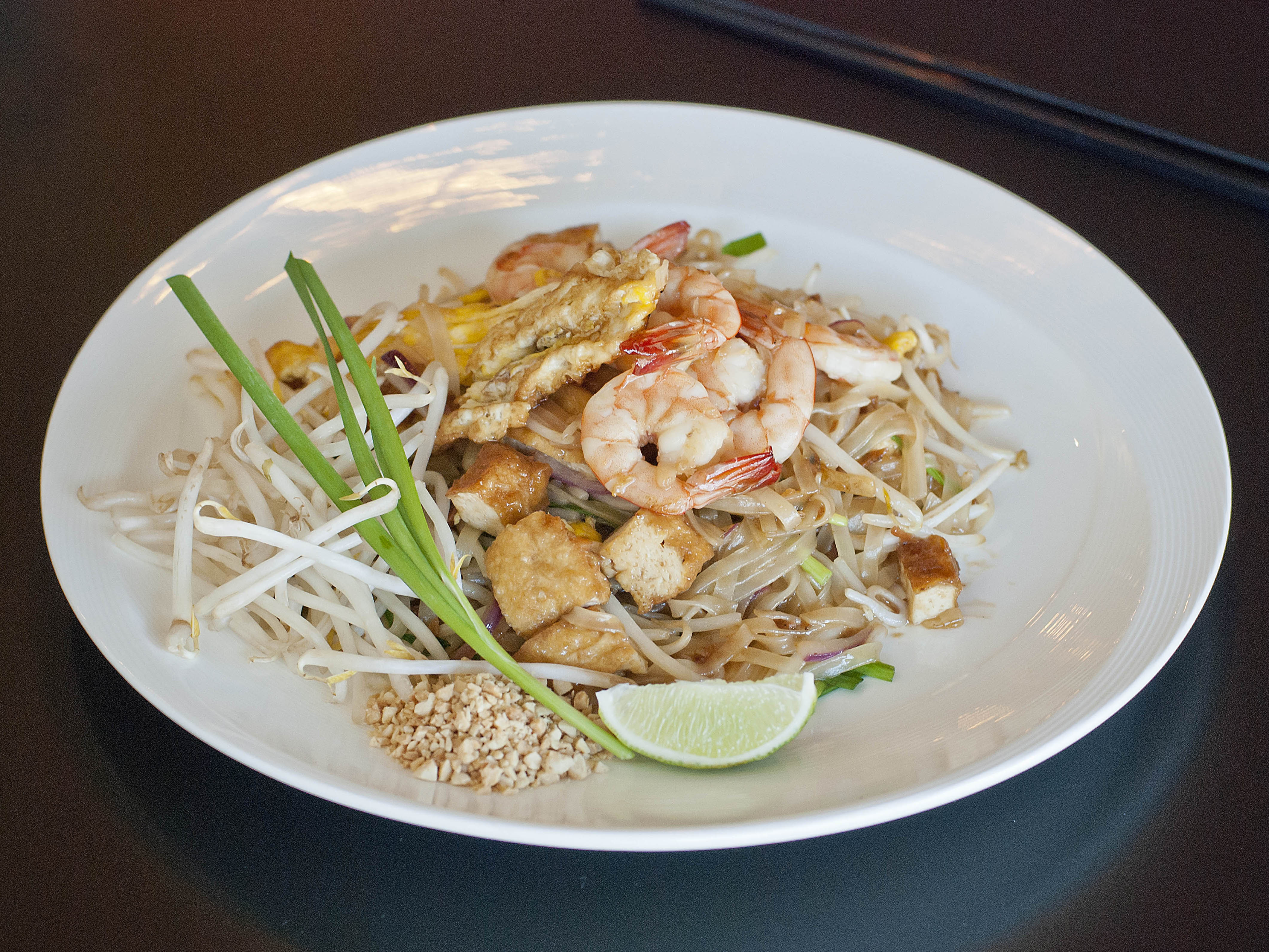 Order Pad Thai food online from Derm Restaurant store, San Francisco on bringmethat.com