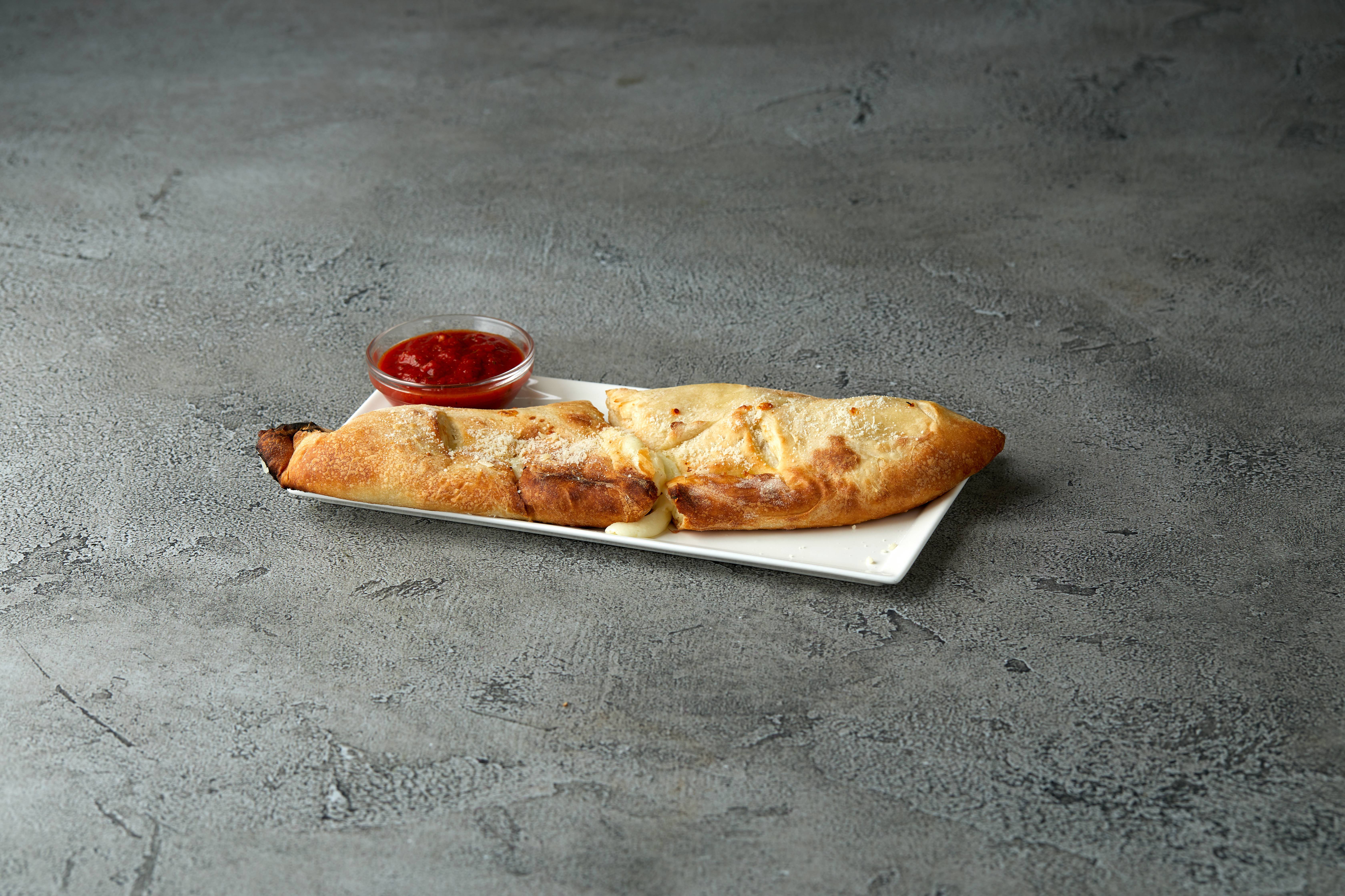 Order Cheese Calzone food online from Italian Express store, Westwood Village on bringmethat.com