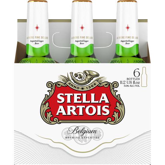 Order Stella Artois, 6pk-12oz bottle beer (5.2% ABV) food online from Aero Liquor And Junior Market store, Burbank on bringmethat.com
