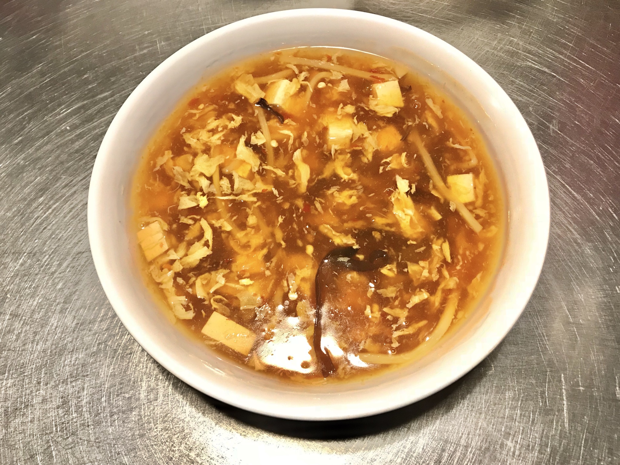 Order Hot and Sour Soup food online from Genghis Khan Restaurant store, Seattle on bringmethat.com