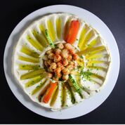 Order 6. Hummus food online from Wally's Falafel and Hummus store, Minneapolis on bringmethat.com