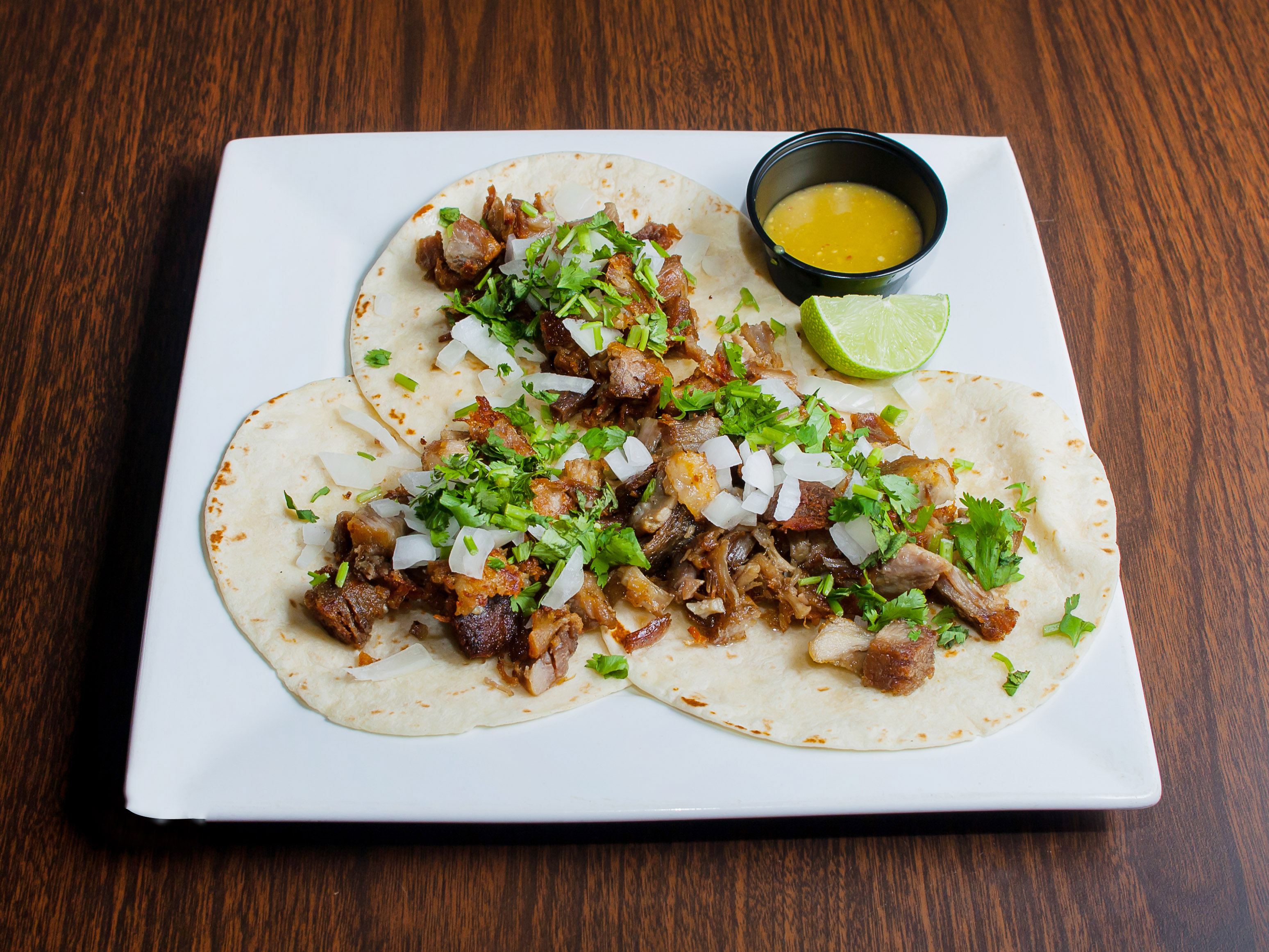 Order Tacos de Carnitas food online from The Blue Iguana Bar & Grill store, Columbus on bringmethat.com