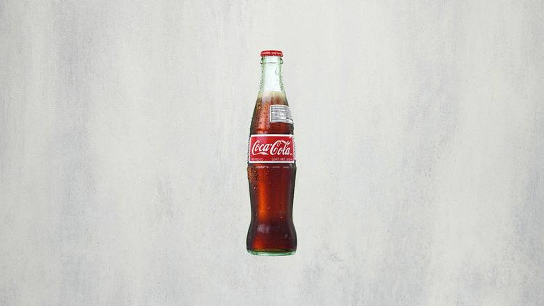 Order Mexican Coke (12 oz bottle) food online from MOD Pizza store, Hummels Wharf on bringmethat.com