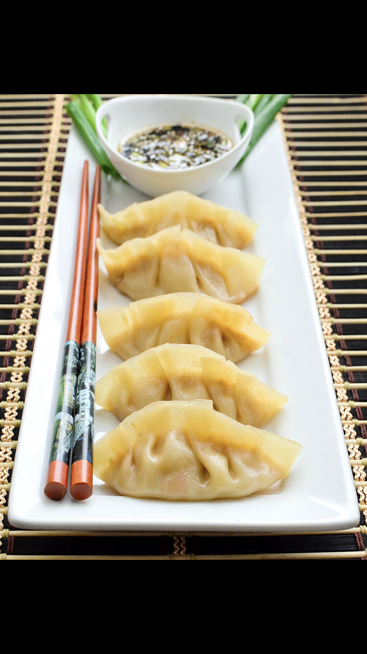 Order 6. Homemade Steamed Dumplings food online from Chopsticks Chinese Cuisine store, Ann Arbor on bringmethat.com