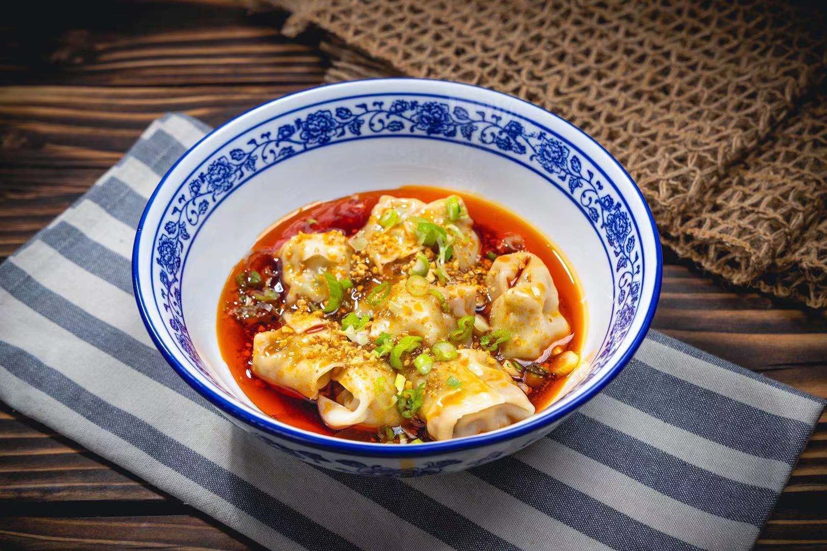 Order E13. Pork Wontons In Spicy Chili Sauce food online from Northern Cafe store, Irvine on bringmethat.com