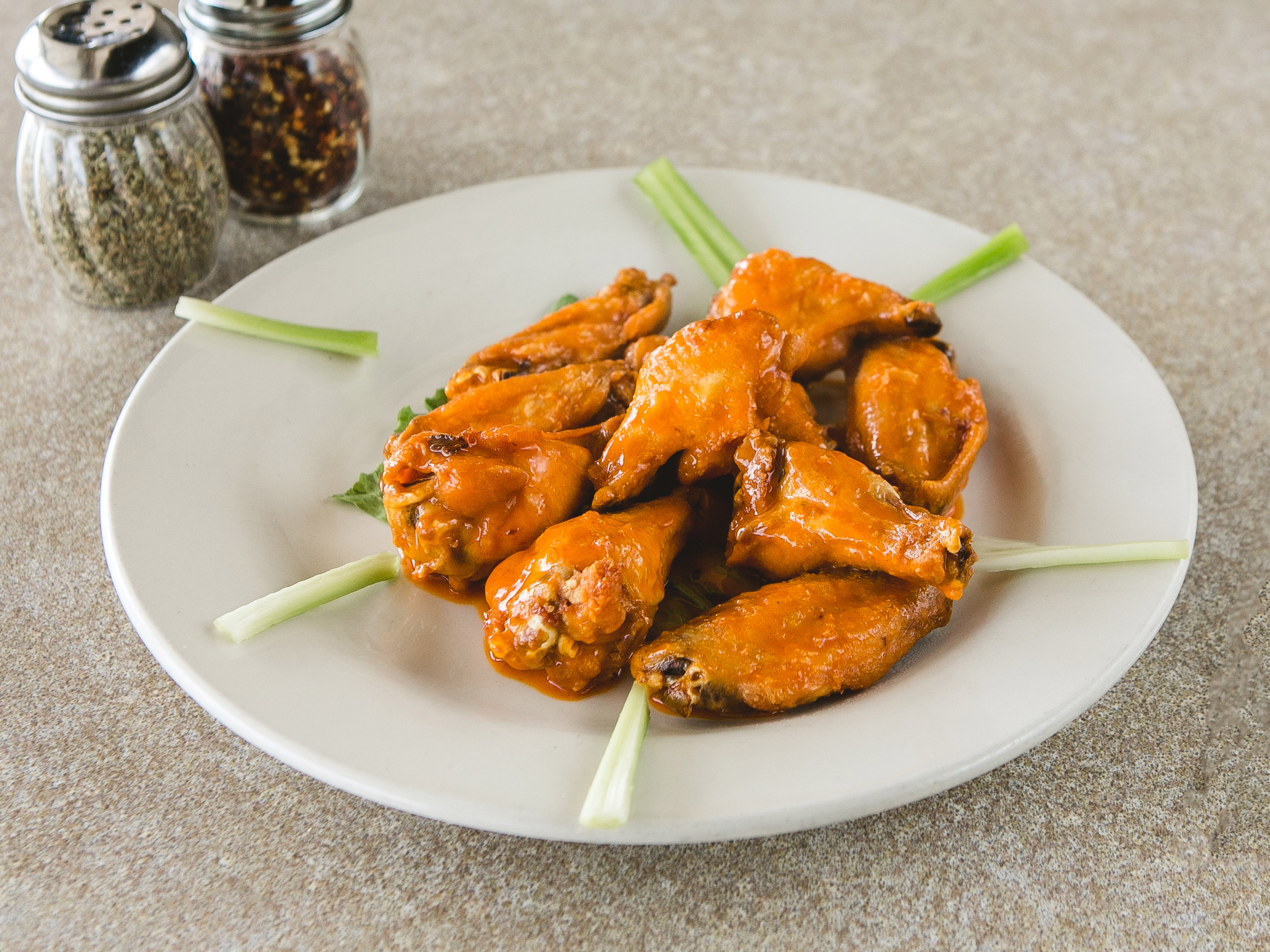 Order Hot Wings food online from The Pizza Stop store, Collegeville on bringmethat.com