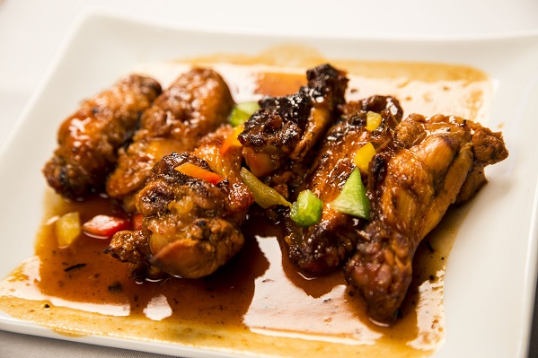 Order Island Wings food online from Spice Island Grill store, Colorado Springs on bringmethat.com