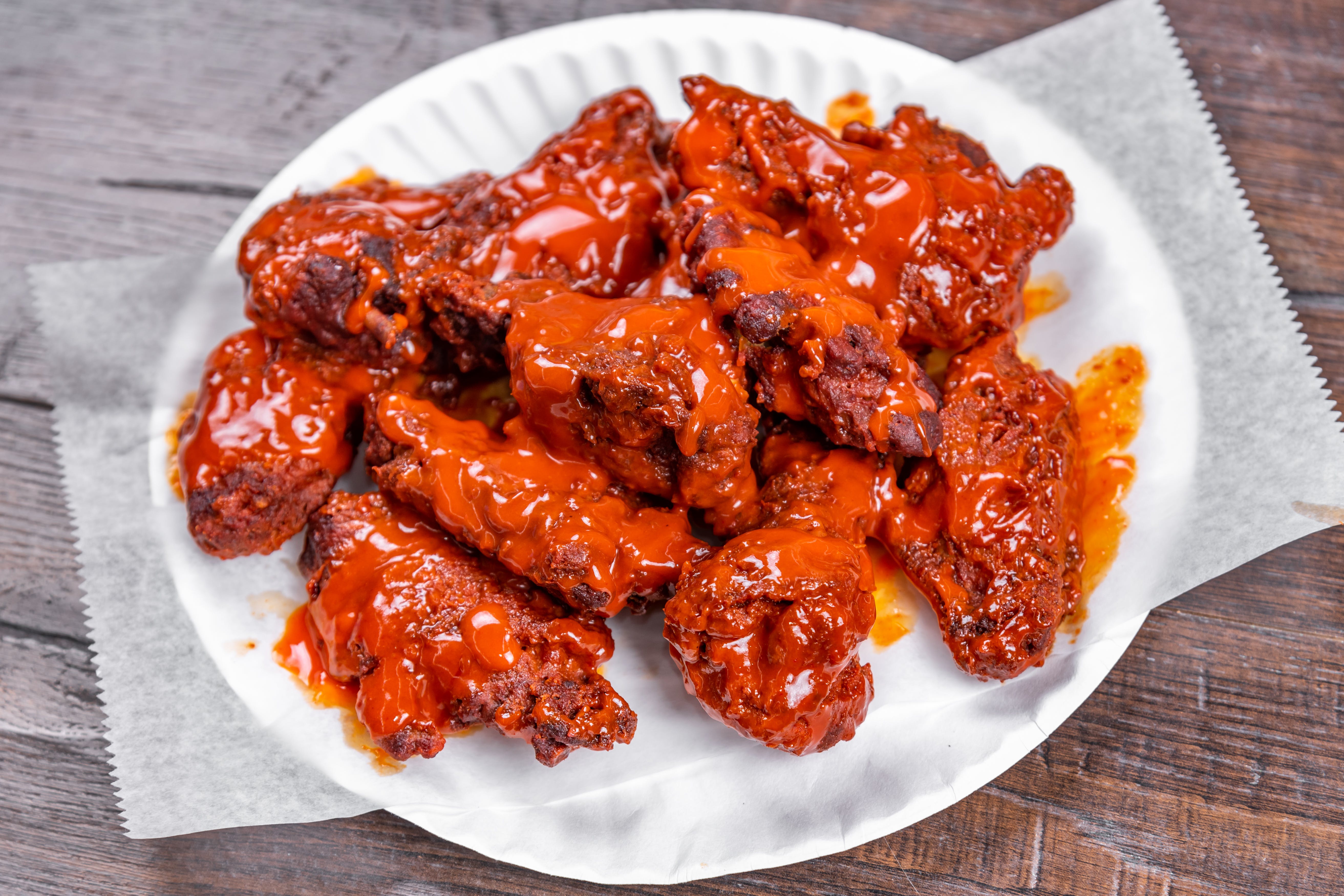 Order Traditional Wings - 5 Pieces food online from Krispy Krunchy Chicken & Pizzeria store, Flushing on bringmethat.com
