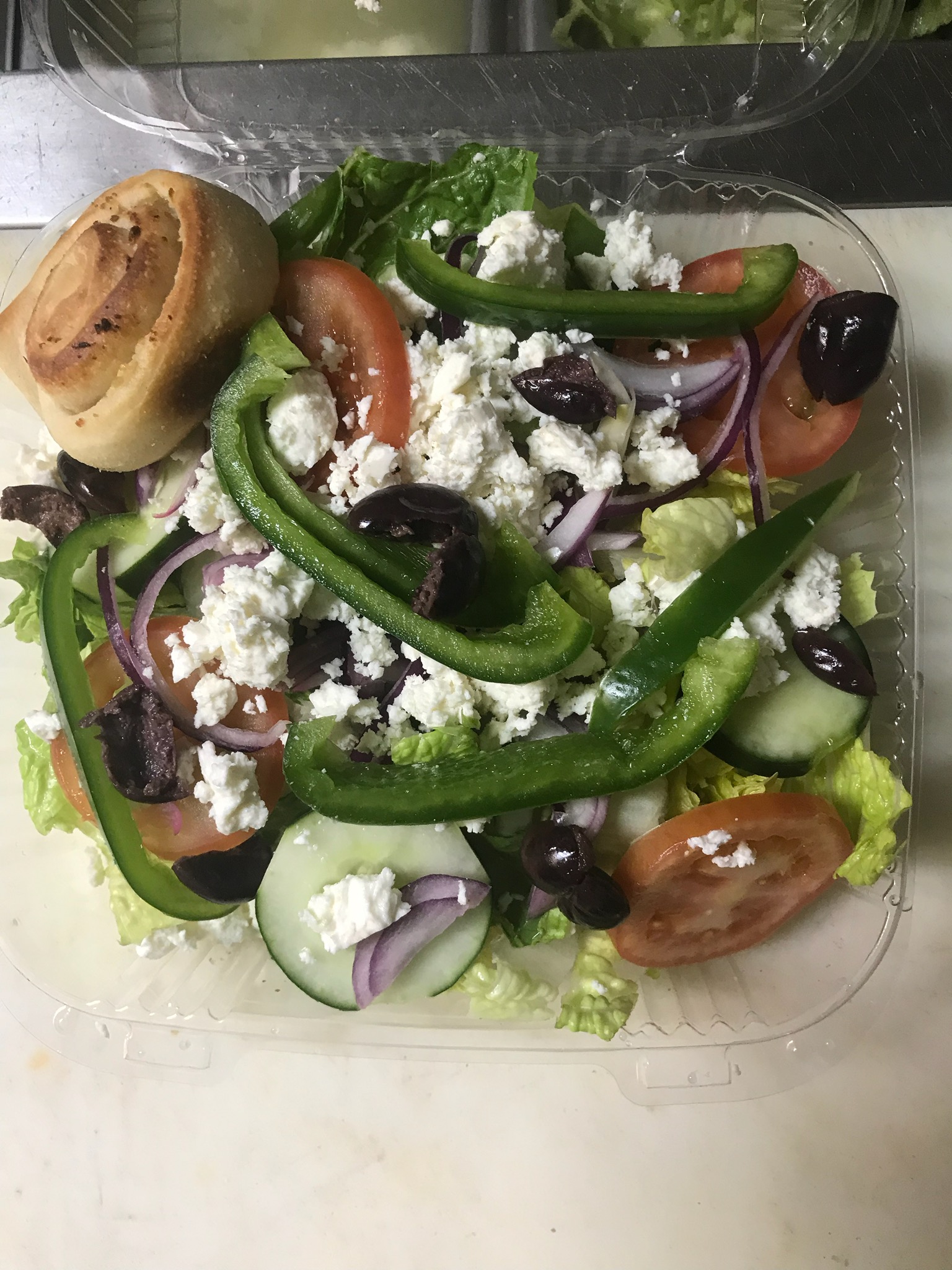 Order Greek Salad food online from Toscana Pizzeria store, Audubon on bringmethat.com