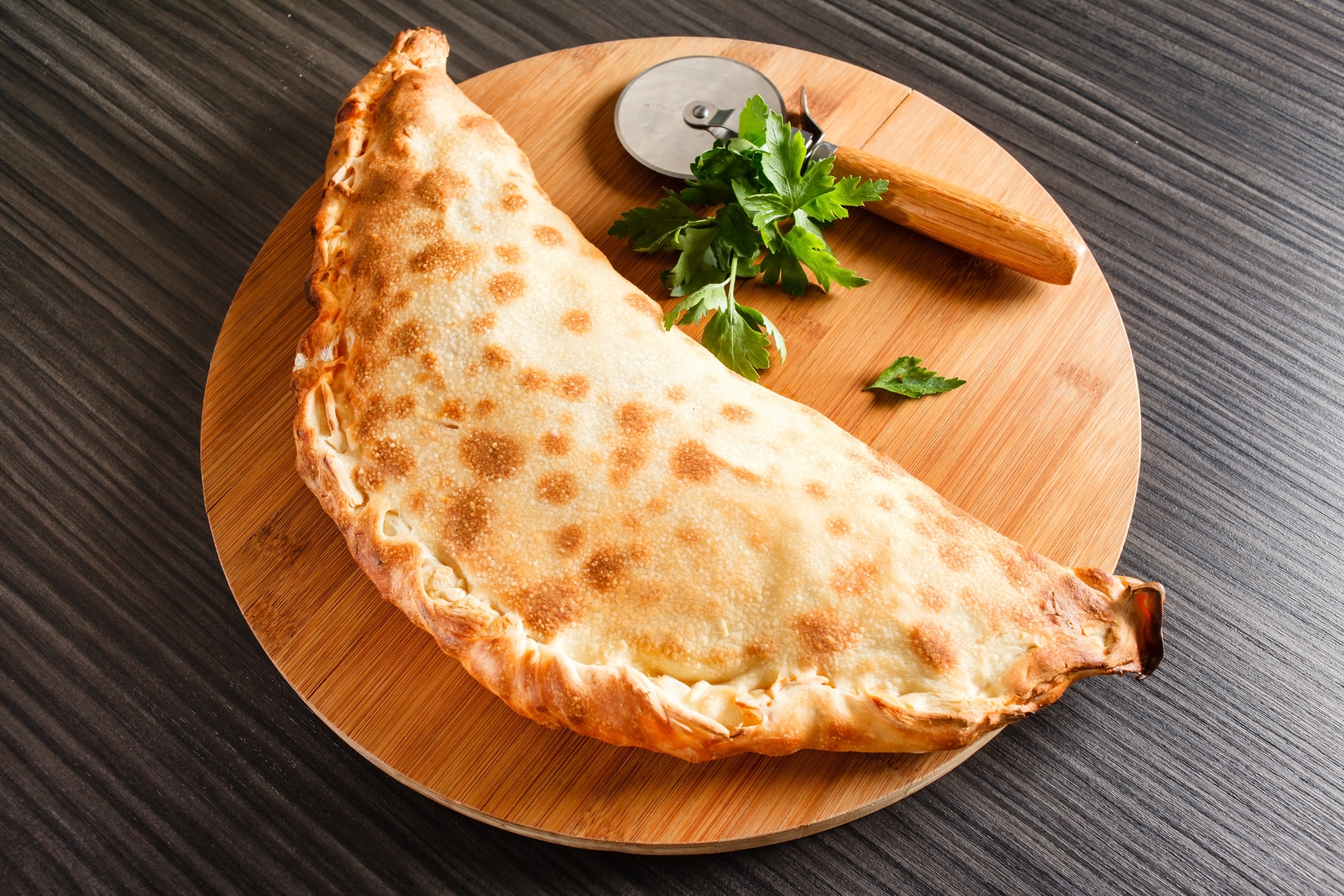 Order Regular Calzone food online from Paradise Pizza & Grill store, Southington on bringmethat.com