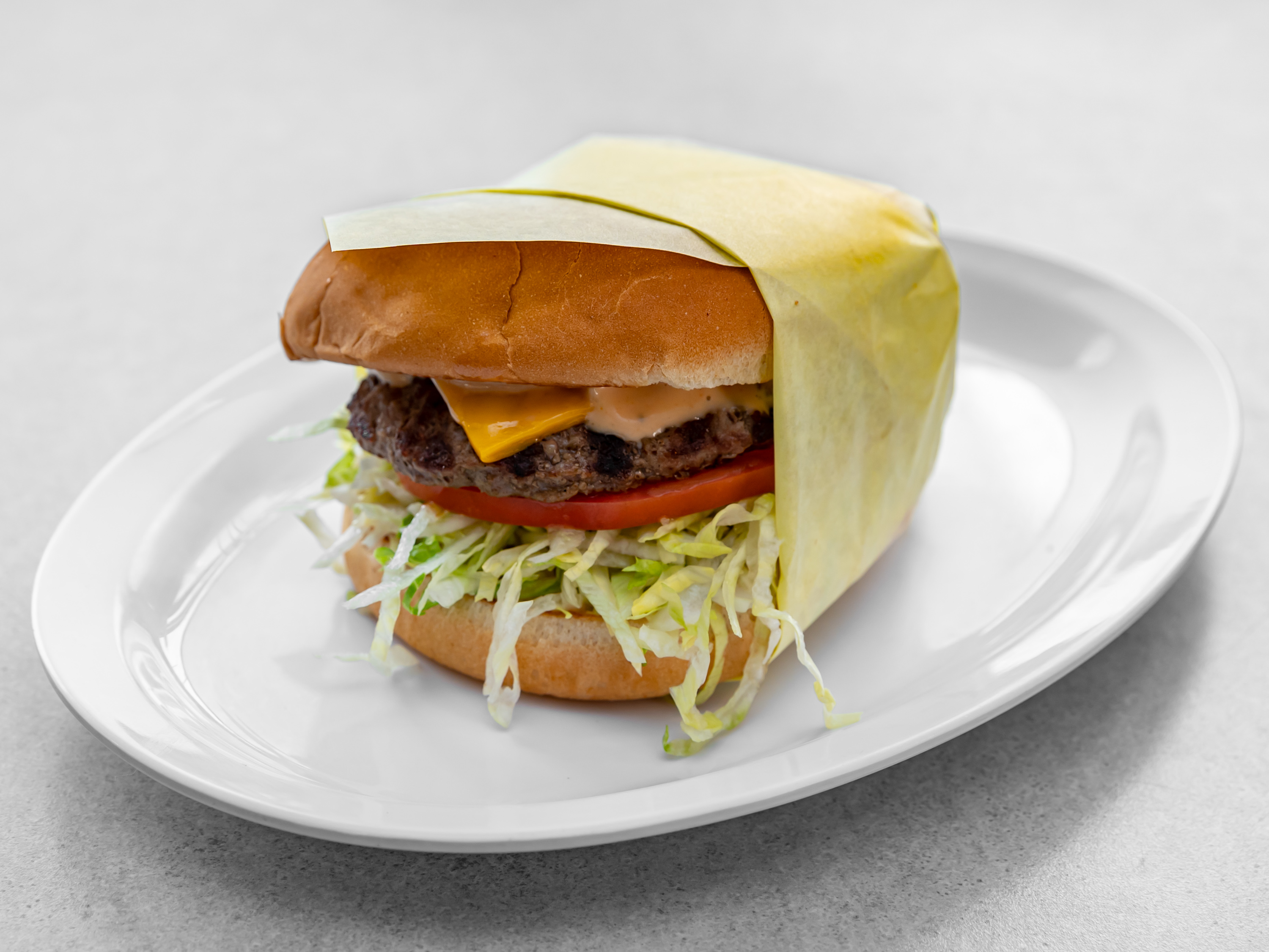 Order Cheeseburger food online from Omega Burgers Lakewood store, Lakewood on bringmethat.com