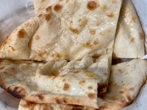 Order Butter Naan food online from Crown of India store, Los Angeles on bringmethat.com